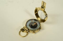 Brass prismatic surveying compass by J.M. Glauser London in 1945