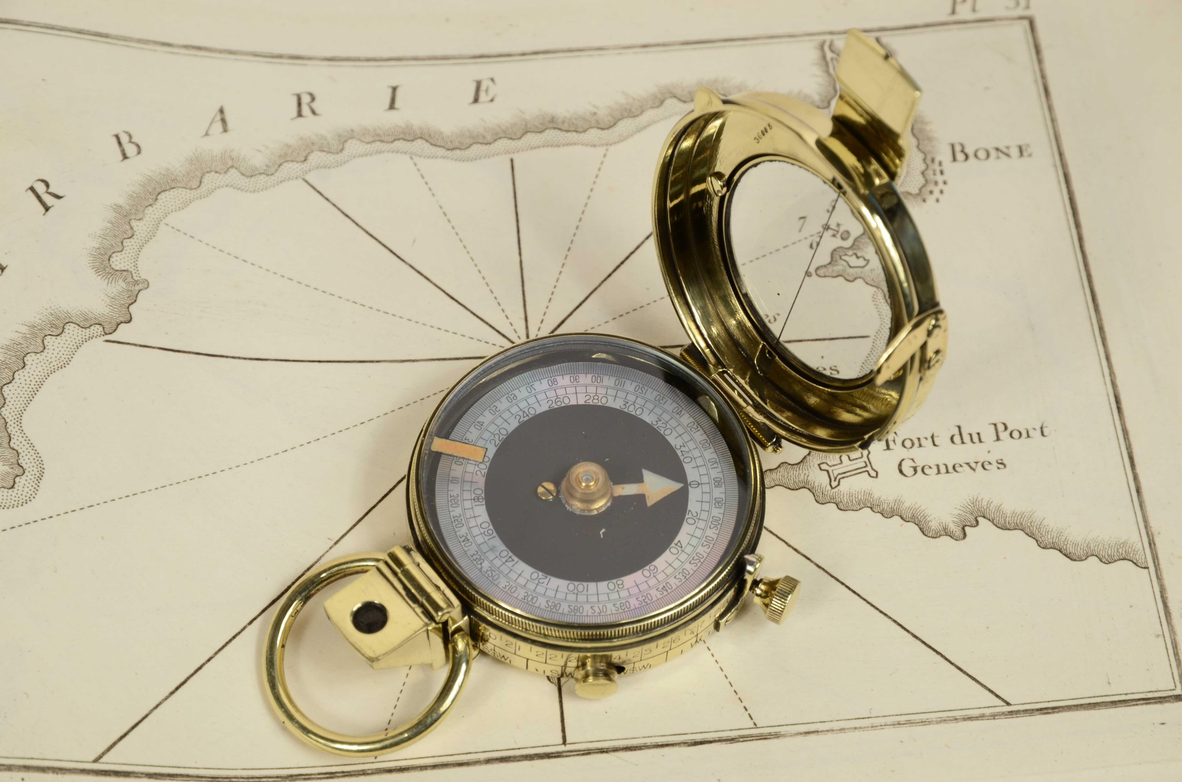 Brass prismatic surveying compass; this is a small compass, signed F-L ( French Limited) No.   74304 of 1917,  verner's Pattern named after the designer, Colonel William Willoughby Cole Verner  (1852-1922) and supplied to British officers, typically