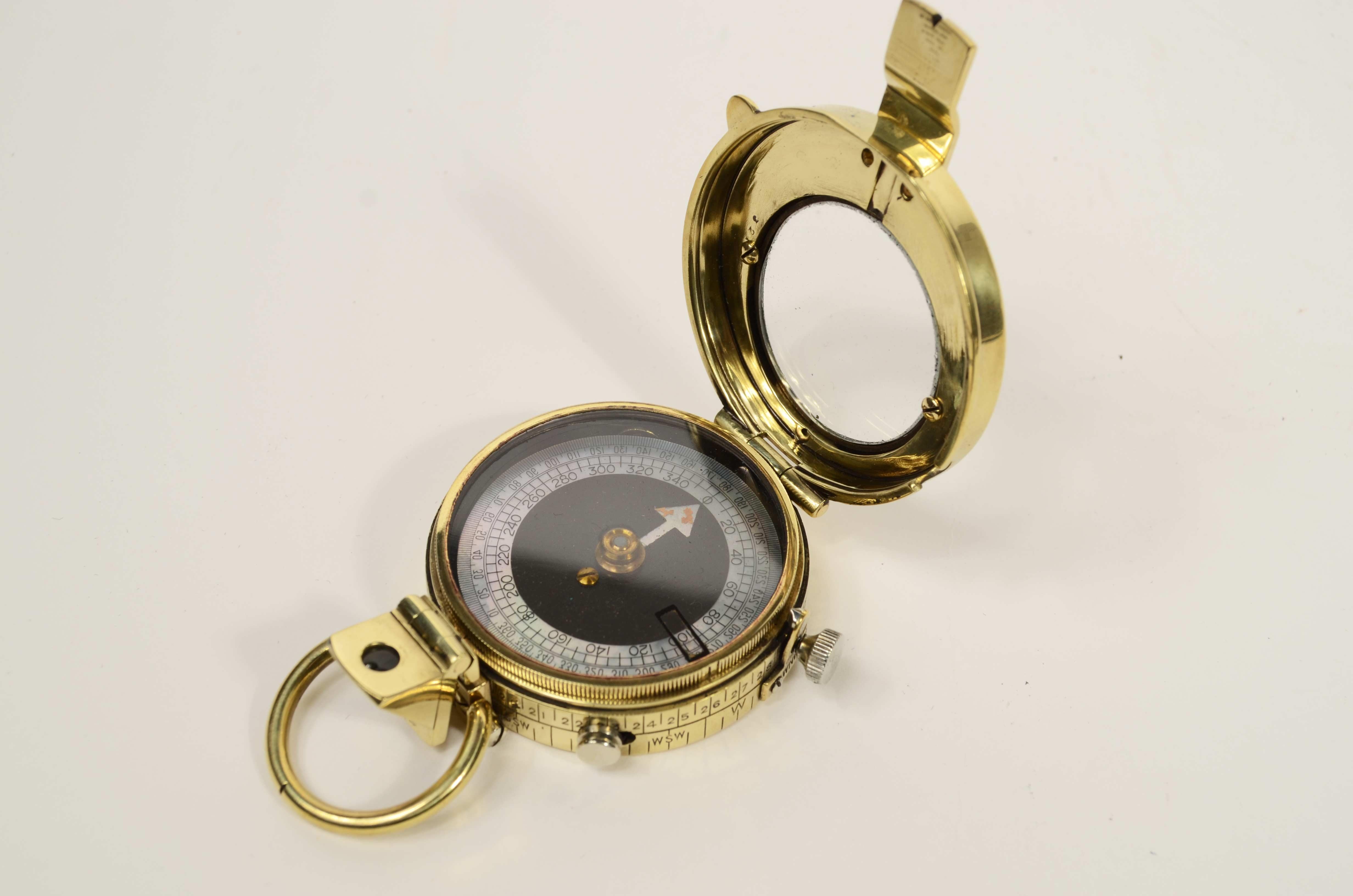 Early 20th Century Prismatic brass compass leather case signed E. Koehn Geneve Suisse 1917 For Sale