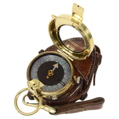 Prismatic brass compass leather case signed E. Koehn Geneve Suisse 1917