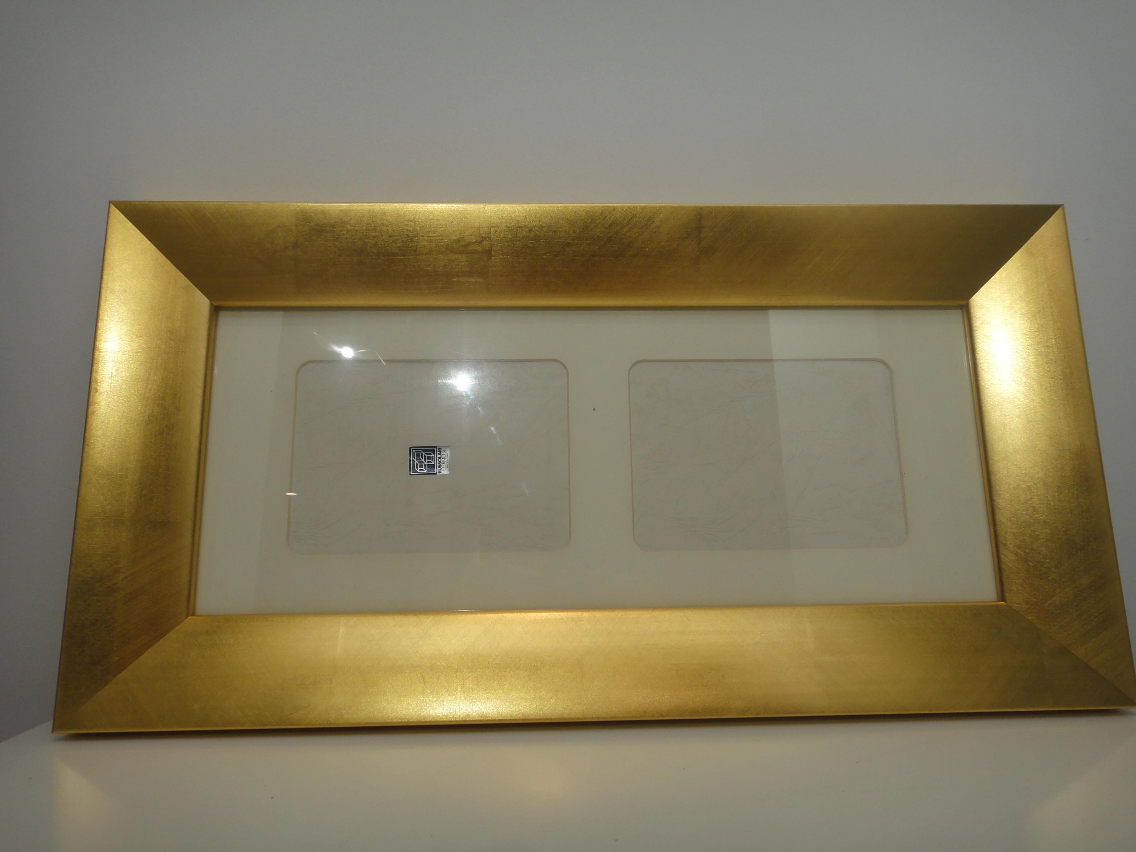 Bussolari giltwood double photo frame offered for sale is an elegant new giltwood double picture frame from Bussolari. The frame can be displayed vertically or horizontally.