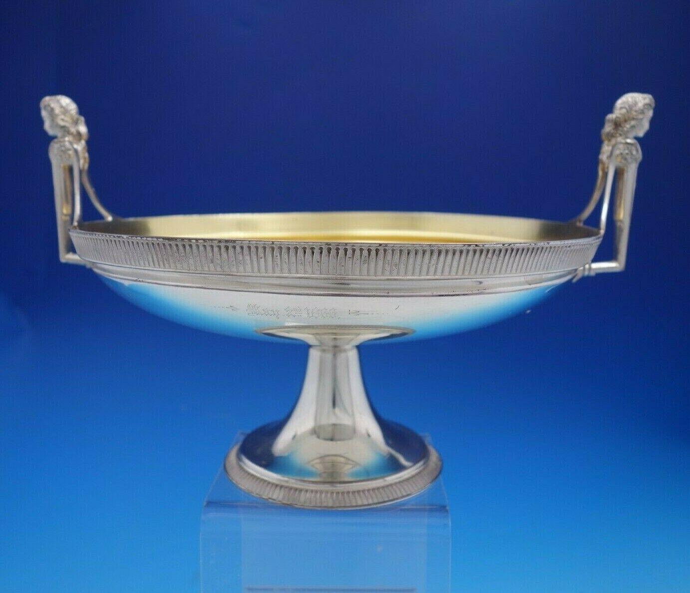 Bust by Gorham

Exceptional Bust by Gorham sterling silver shallow centerpiece bowl with gold washed interior, bust handles, and Acanthus decor. It is marked #211. This piece measures 10 1/4