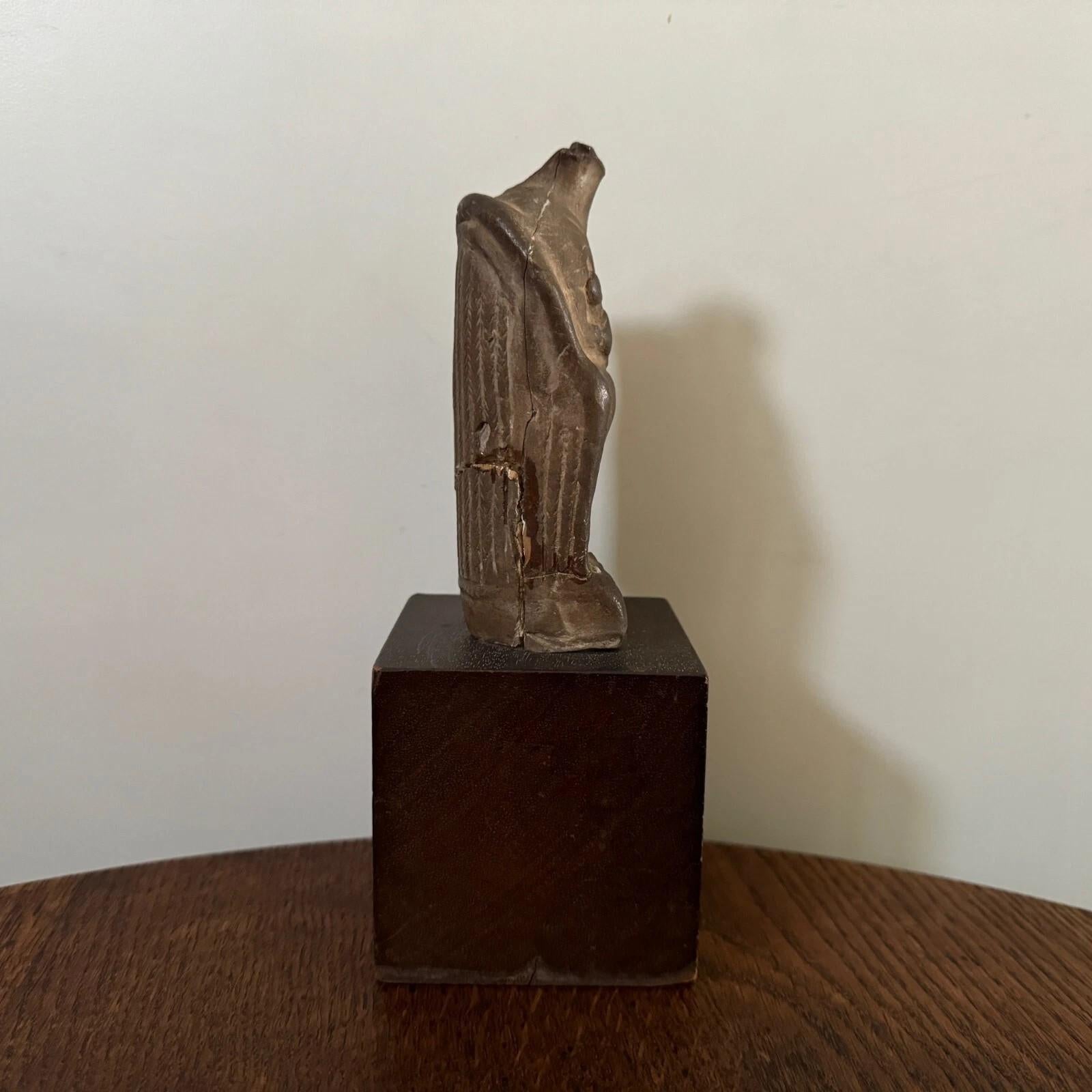 This bust is a studio plaster piece made by Charles Filleul. It is a patinated plaster mounted on a wooden cube. It is a 20th-century work.

Regarding condition, please note some damage in various areas; it has been broken and repaired.

Charles