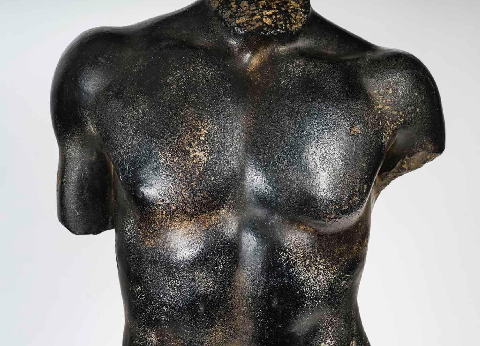 Bust in the taste of Antiquity, 20th century.

Antique-style nude male bust in composite material, 20th century.    
h: 70cm, w: 45cm, d: 22cm

