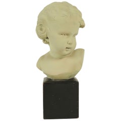Busto di bambino in terracotta del XX secolo, firmato Gobet