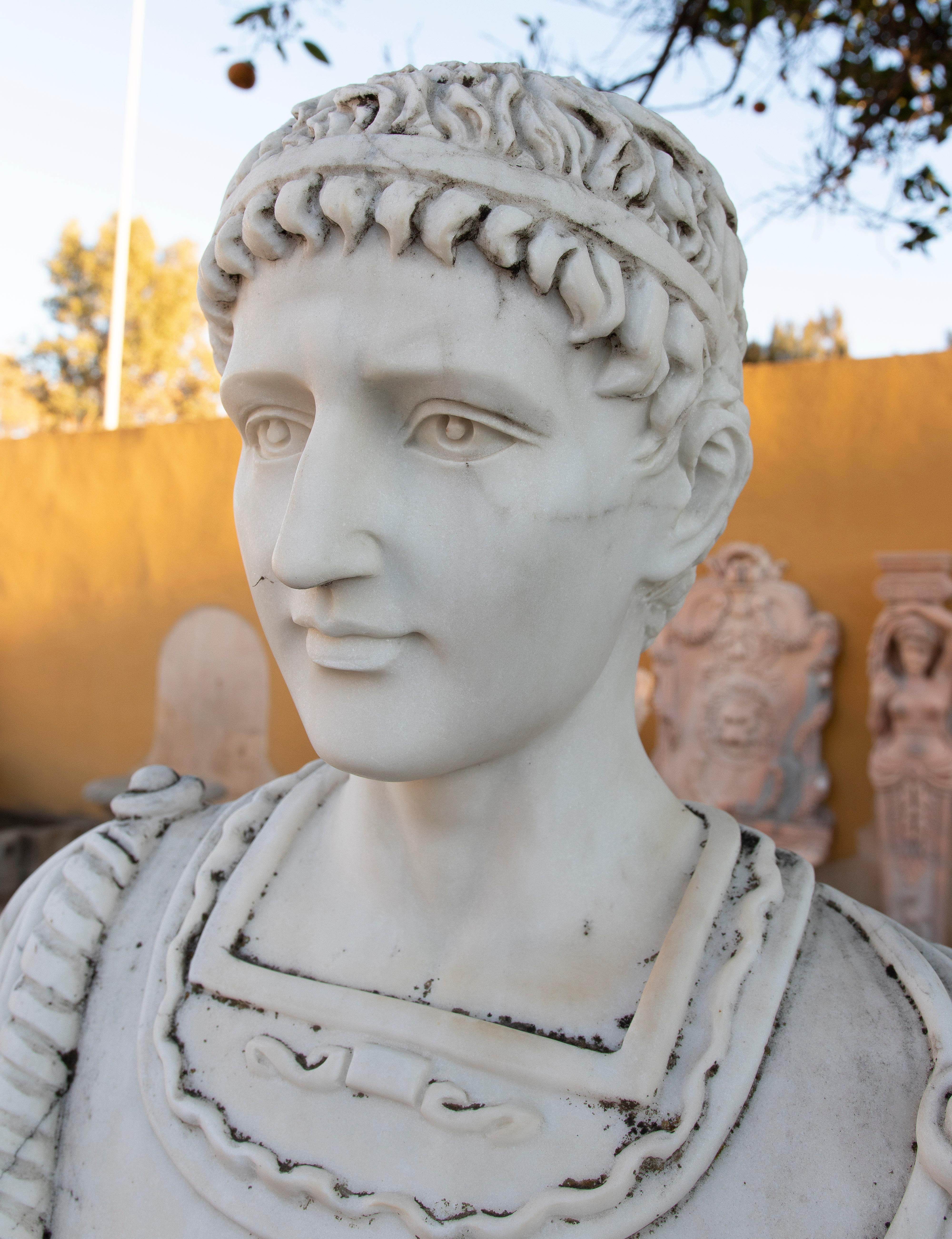Hand-Carved Bust of a Roman Character with Toga, Hand Carved in White Marble For Sale