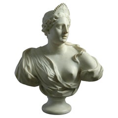 Busto de mujer con diadema