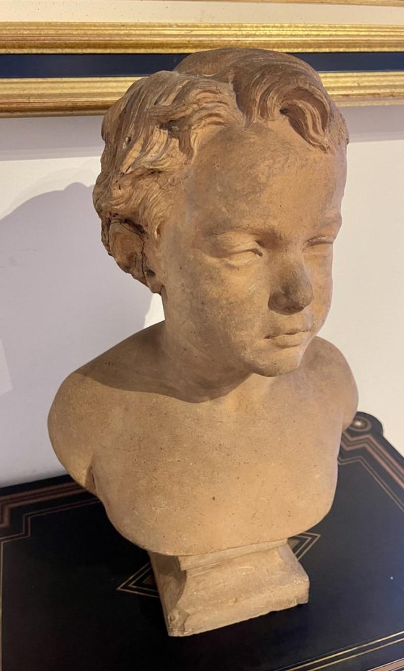 Elevate your interior with this exquisite bust of a young boy, with bare shoulders, signed and precisely dated 1863.
This stunning sculpture is a true representation of 19th-century artistry, boasting magnificent warm hues and a genuine connection
