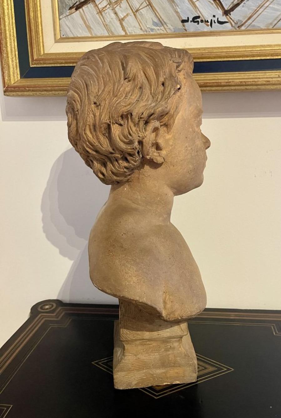 Napoleon III Bust of a young boy with bare shoulders, signed in the style of Camille Claudel For Sale