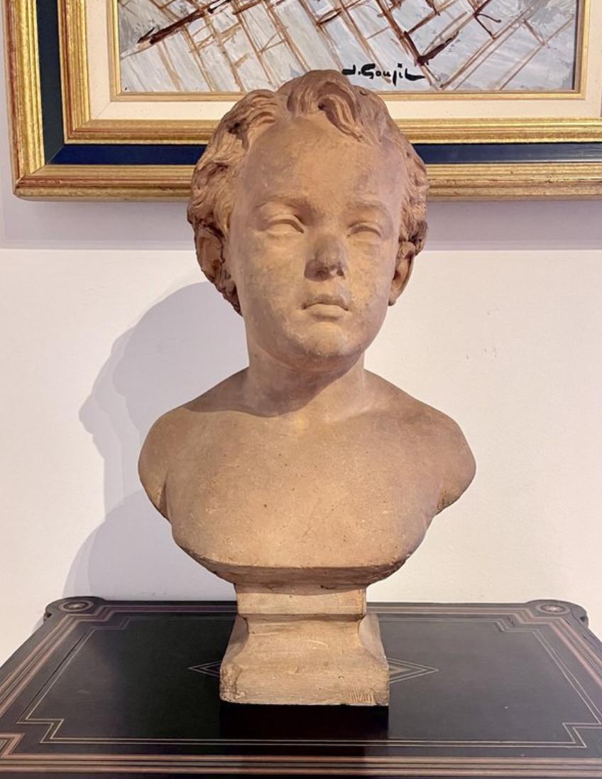 Appliqué Bust of a young boy with bare shoulders, signed in the style of Camille Claudel For Sale