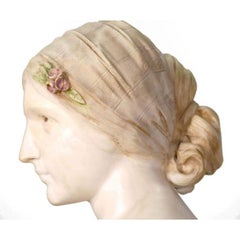 Busto de mujer joven en mármol y alabastro