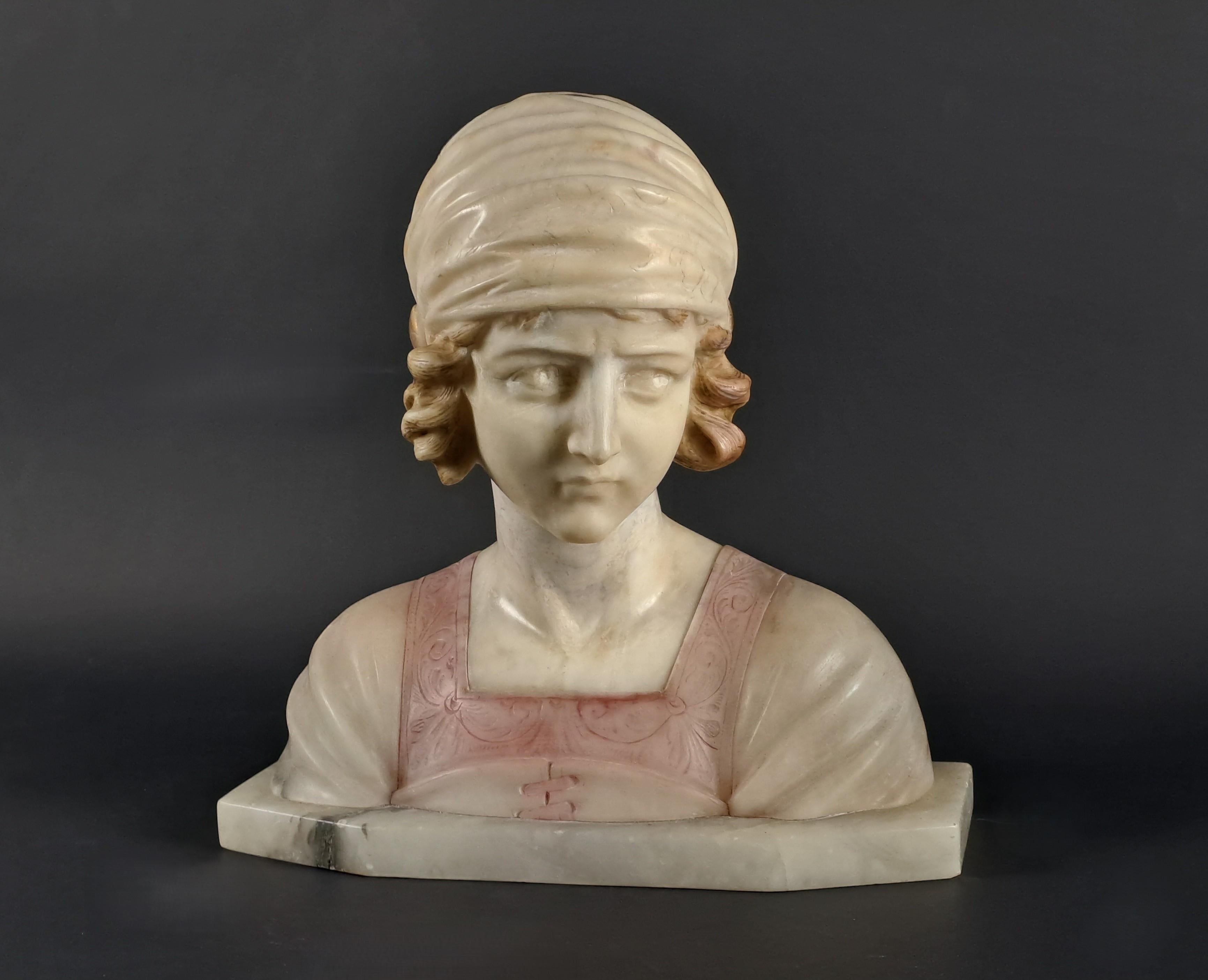 Bust of a Young Woman in Polychromed Alabaster  

French or Italian work circa 1900   

Good condition (patina and wear from use)