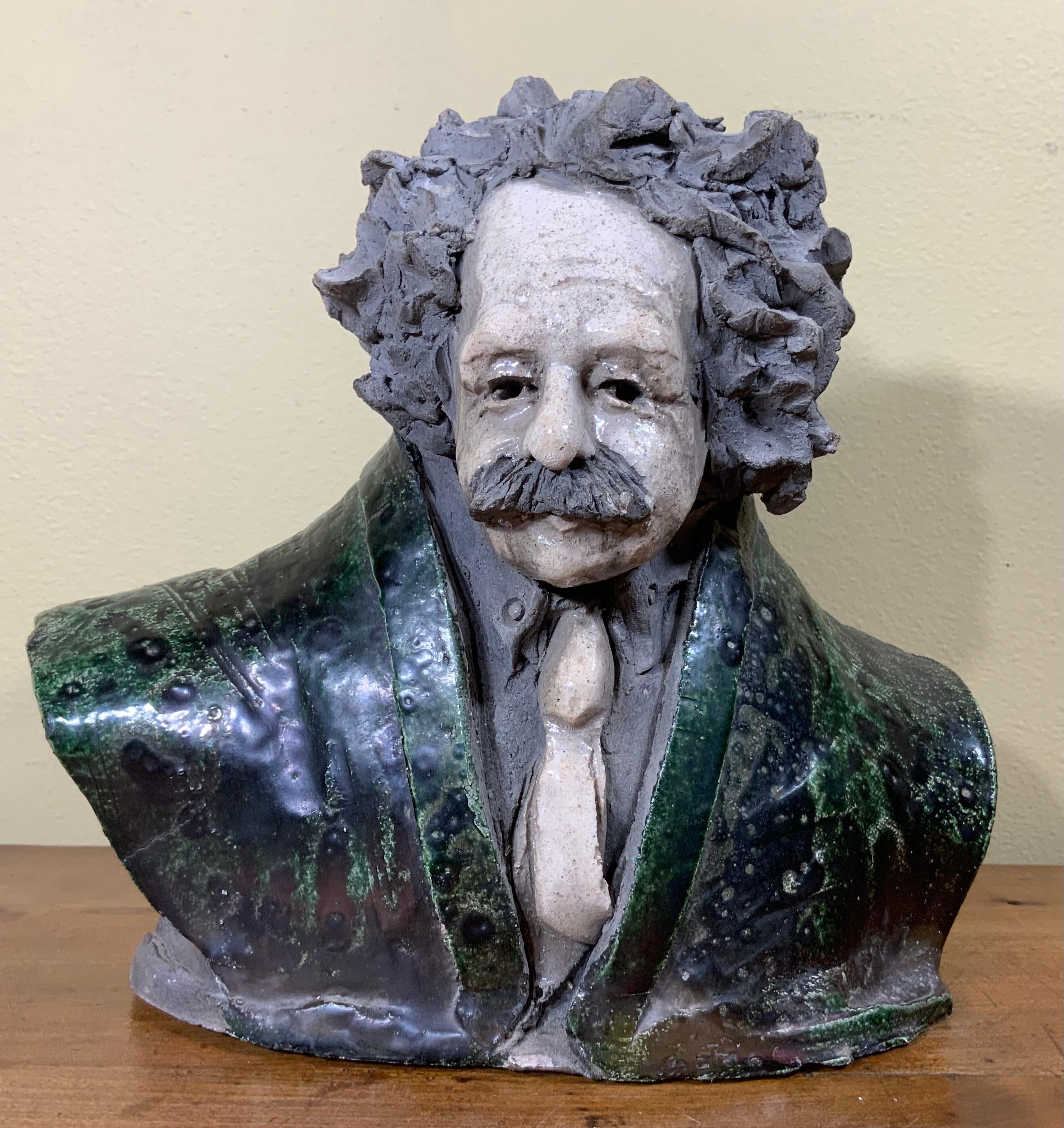 A funky sculpture of Albert Einstein “ thinking “ made of ceramic, hand painted and glazed by American artist. The sculpture is signed illegibly and dated on the back.
  