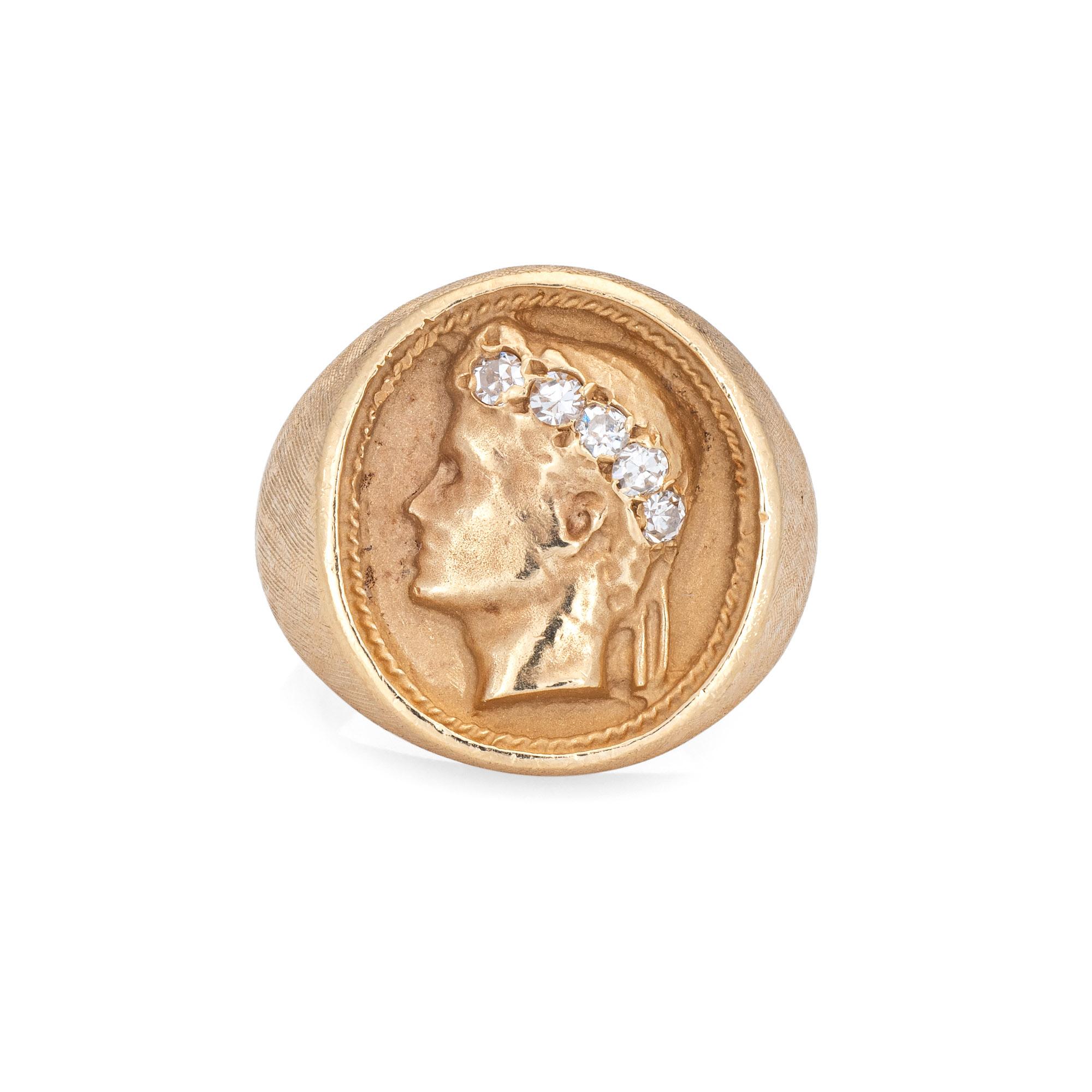 Stylish vintage signet ring featuring the bust of Caesar crafted in 14 karat yellow gold (circa 1960s to 1970s). 

Five single cut diamonds total an estimated 0.10 carats (estimated at G-H color and VS2-SI1 clarity). 

The stylish vintage ring