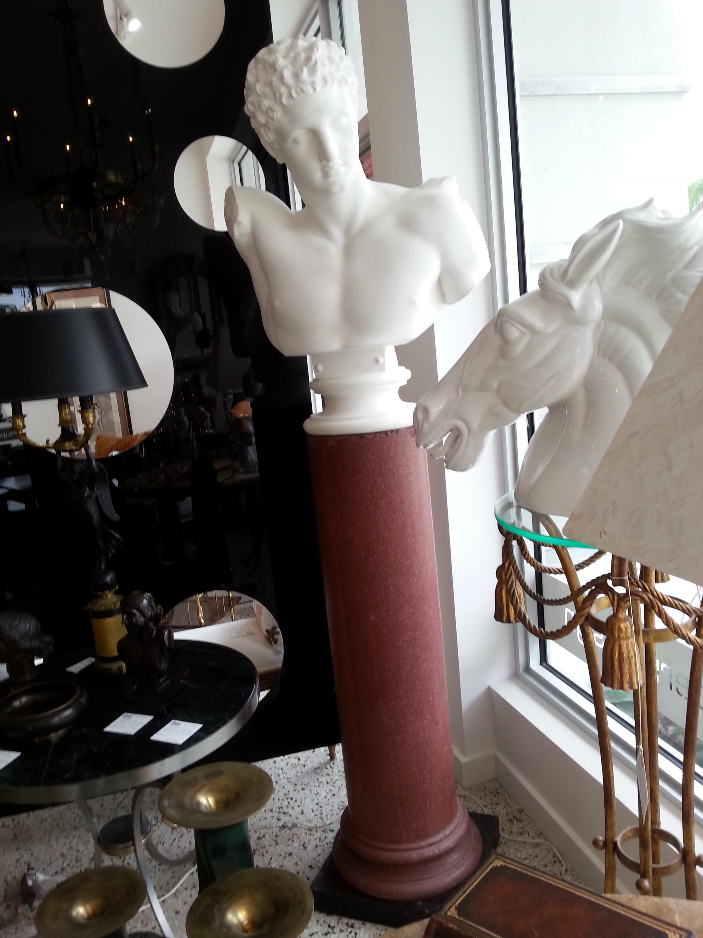 This large scale, stylish and chic plaster bust of Hermes (Hermes with the Infant Dionysos) was acquired from a Palm Beach estate and will make a statement piece in your home.

Note: Diameter of base is 11