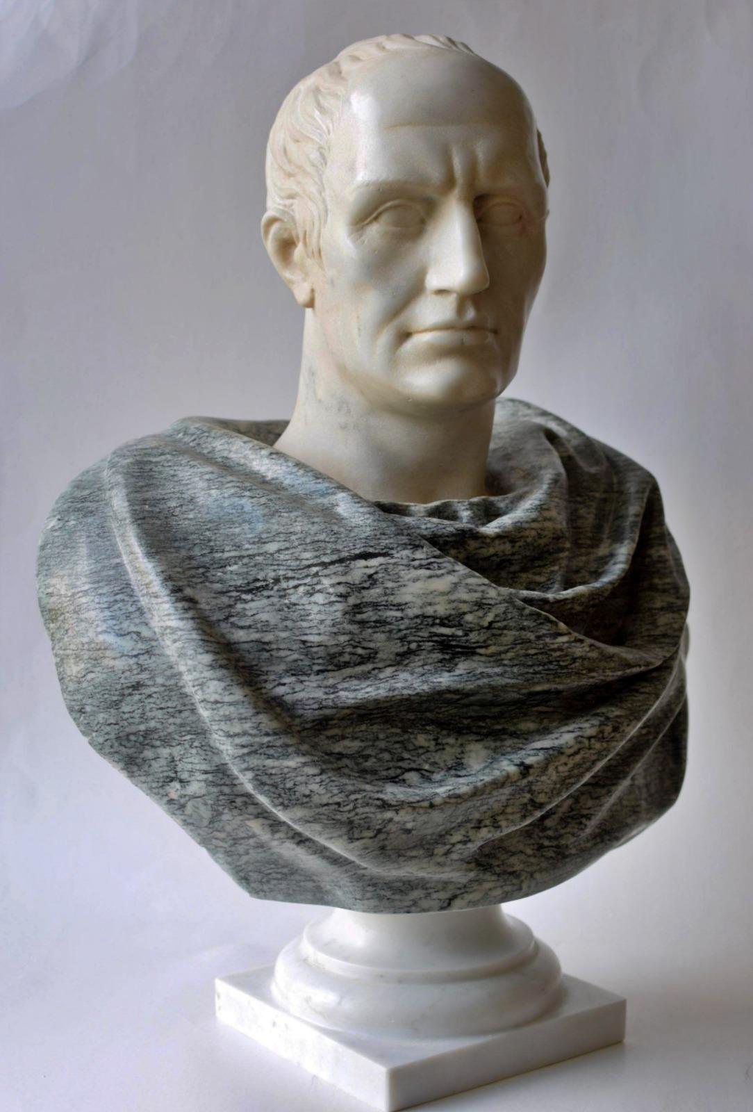 Bust of Julius Caesar carved on Cipollino Apuan Marble end 20th Century


for the bust and white Carrara marble for the head. 
Italy
Turned base in white Carrara marble Original one-of-a-kind model dimensions, including base, 
h 55 x 41 x 28 cm,
