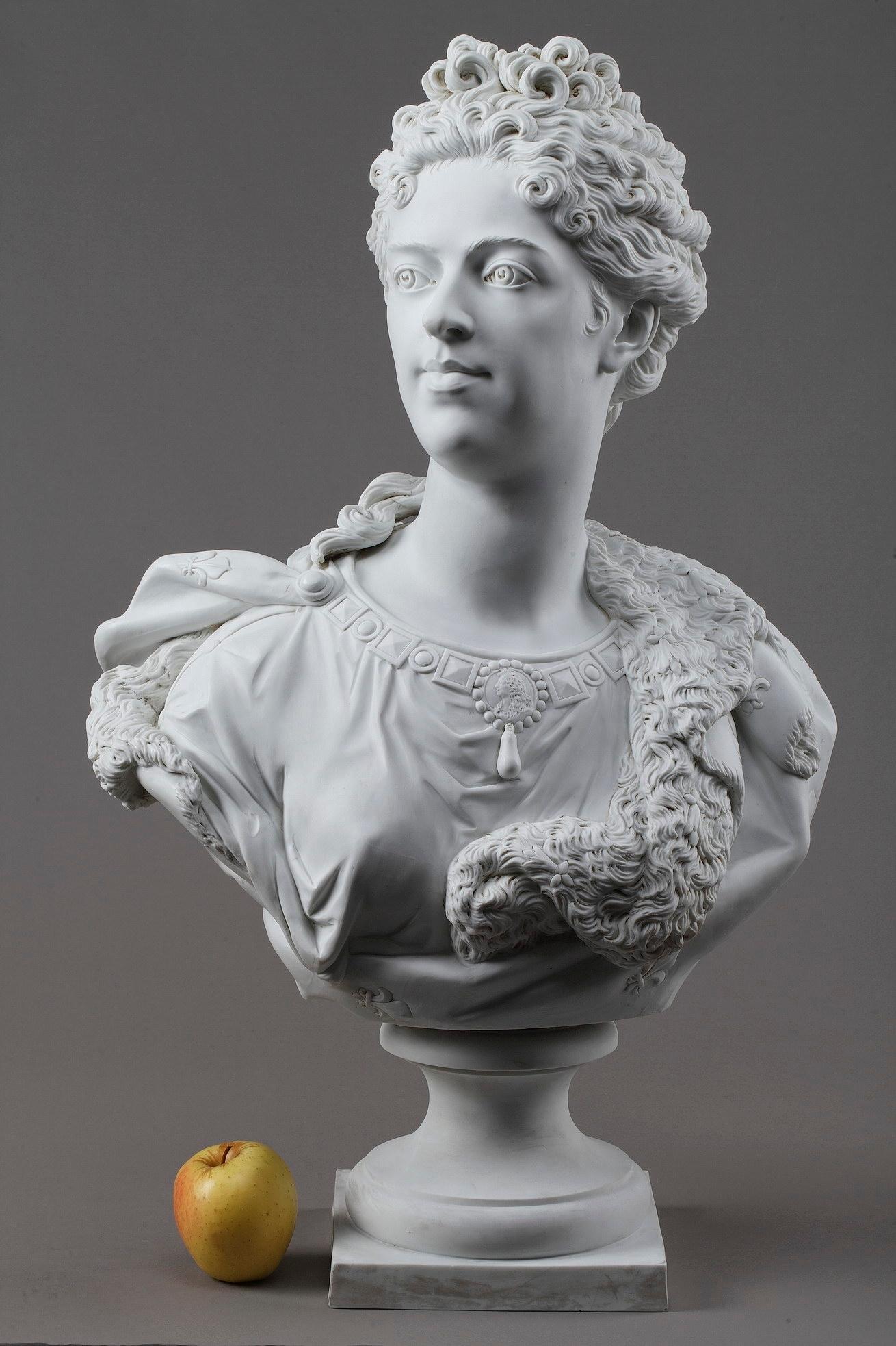 Monumental bisque?porcelain?bust of Marie Adélaïde of Savoy, Duchess of Burgundy after Antoine Coysevox (French, 1640-1720). The original marble was crafted in 1710 and is housed in the Château de Versailles. Marie Adélaïde of Savoy (1685-1712) was