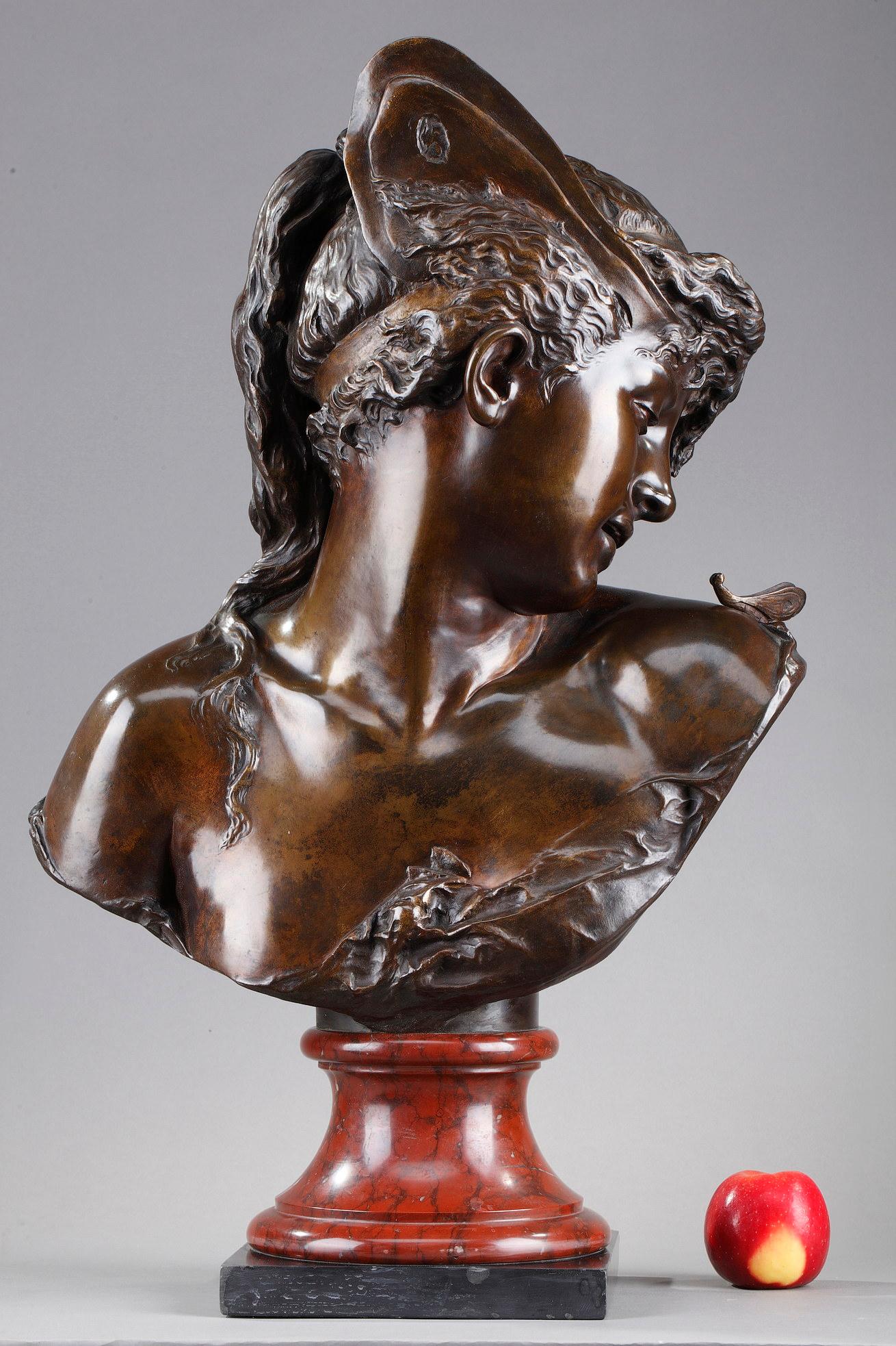 This is a bust of Psyche in patinated bronze by the founders Boyer and Rolland. It represents a young woman wearing butterfly wings in her hair with her head turned towards an insect placed on her shoulder. The little butterfly probably represents