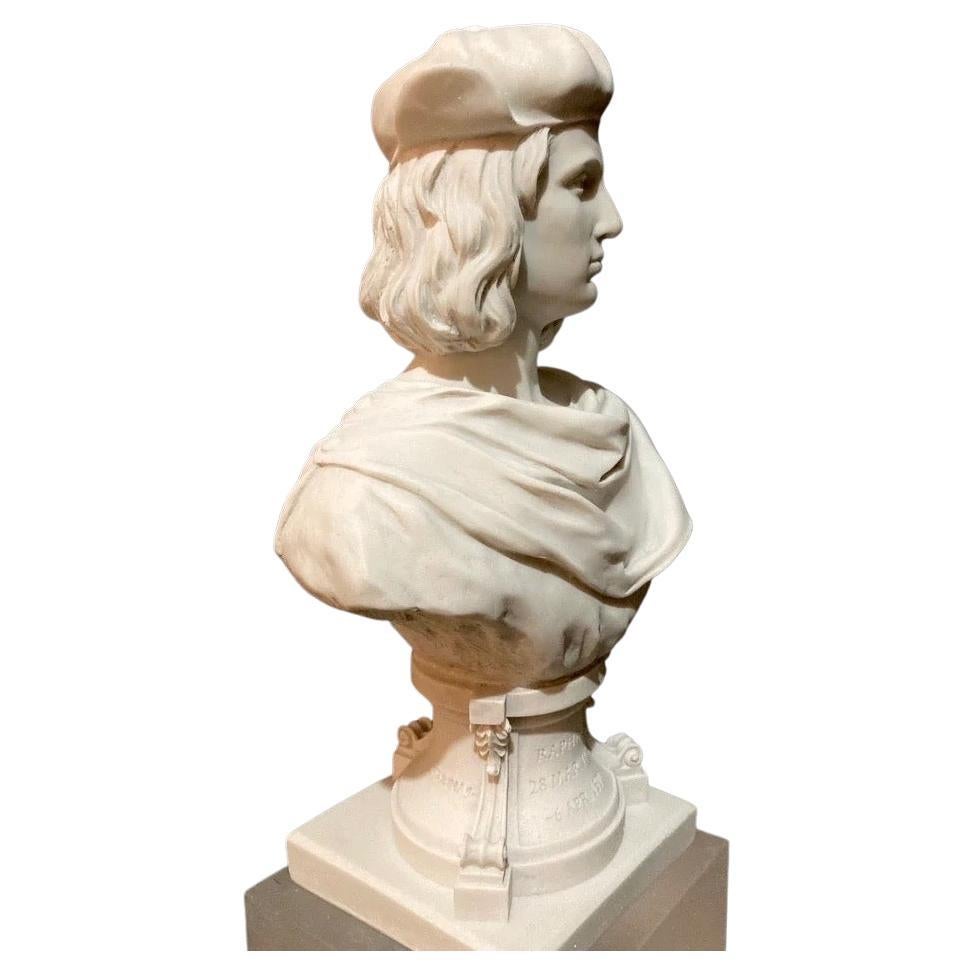 Este busto de Rafael del siglo XX rinde homenaje al renombrado maestro renacentista conocido por sus excepcionales pinturas y contribuciones a la historia del arte. Representada con rasgos serenos y expresión reflexiva, la escultura capta la esencia