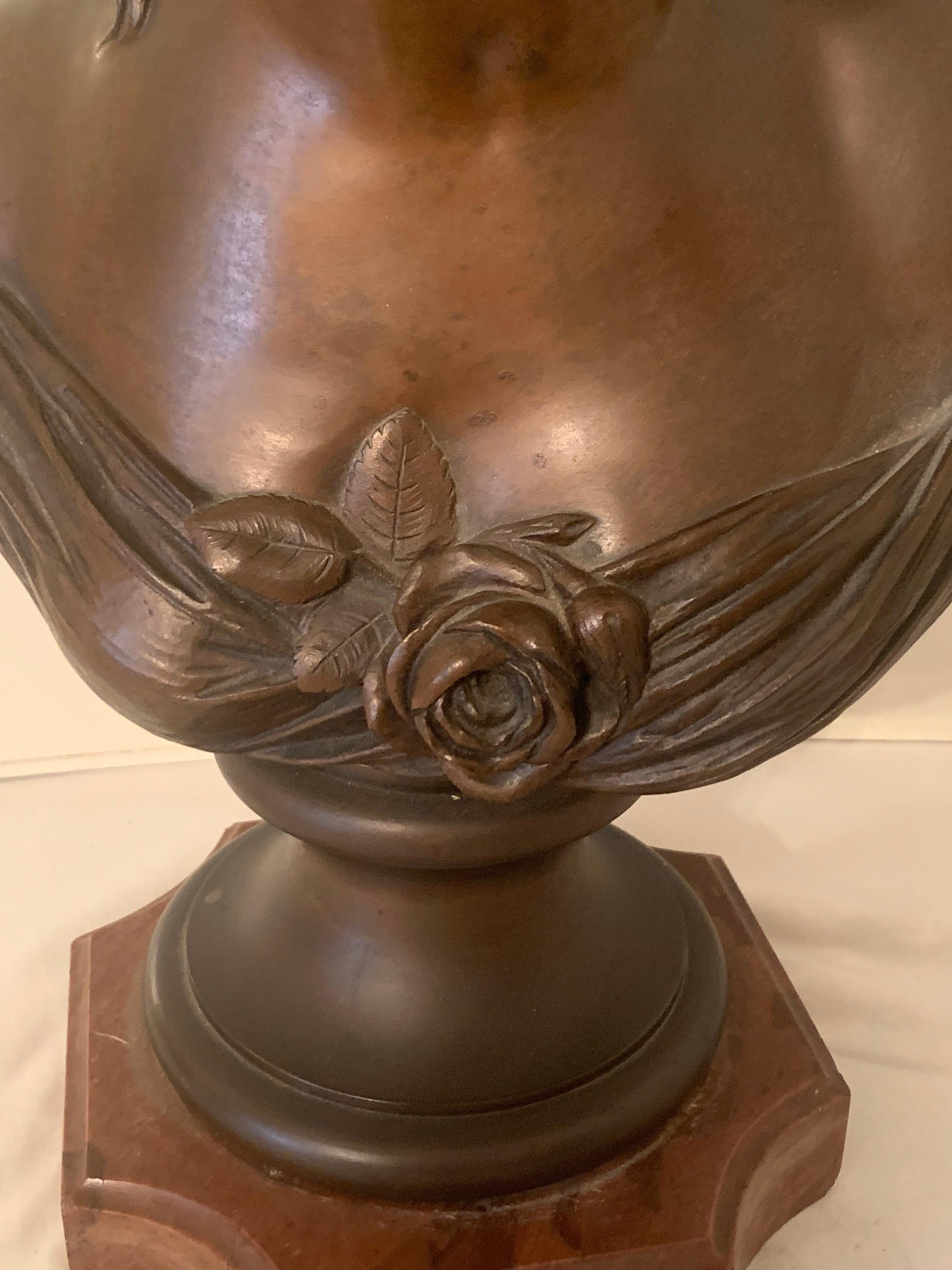 Magnificent bust of women in bronze make in 1920 after the model of Clodion 
The bronze bear a mark of clodion and a date. the bronze is on a red marble base .the bronze is coming probably of one of the famous work shop from this parisian time.
