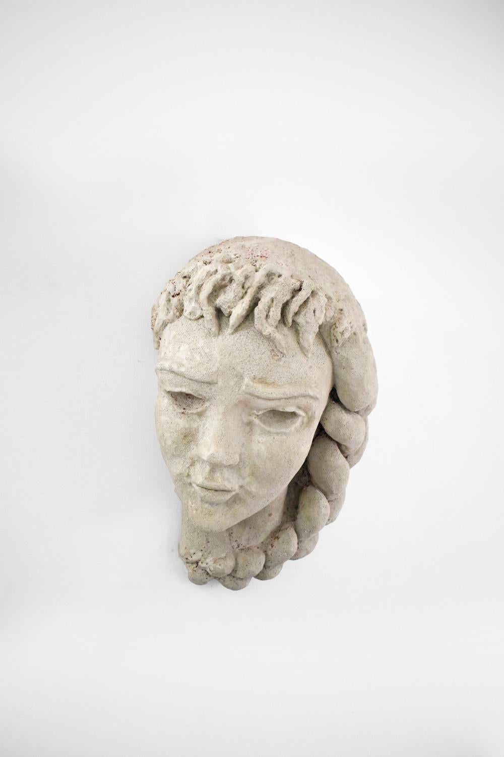 Bust sculpture in stone representing a young lady. France, XXth c.