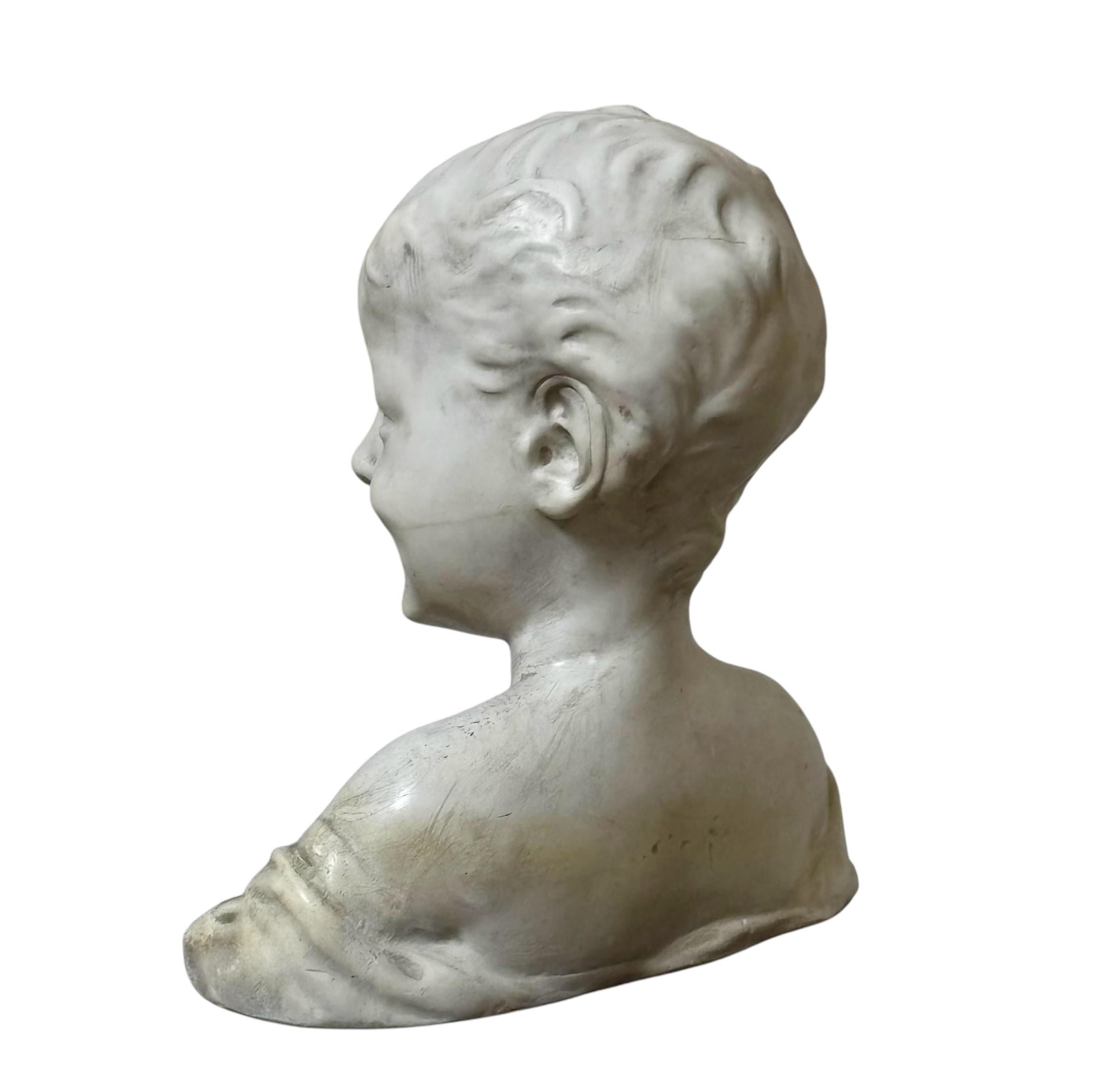 Busto di bambino sonoro del 1.920 circa, di Desiderio da Settignano sulla divina grazia dell'infanzia.