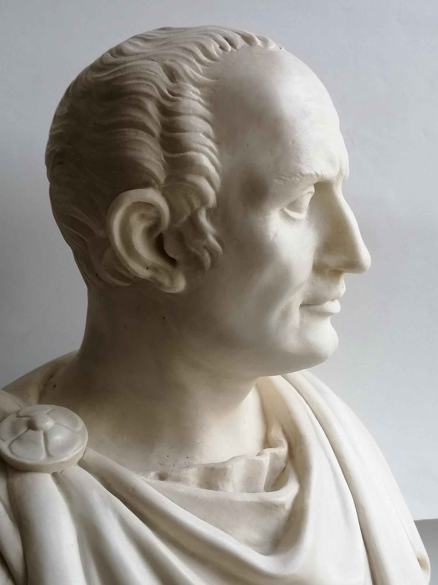 Hand-Crafted Julius Caesar bust in white Carrara marble For Sale