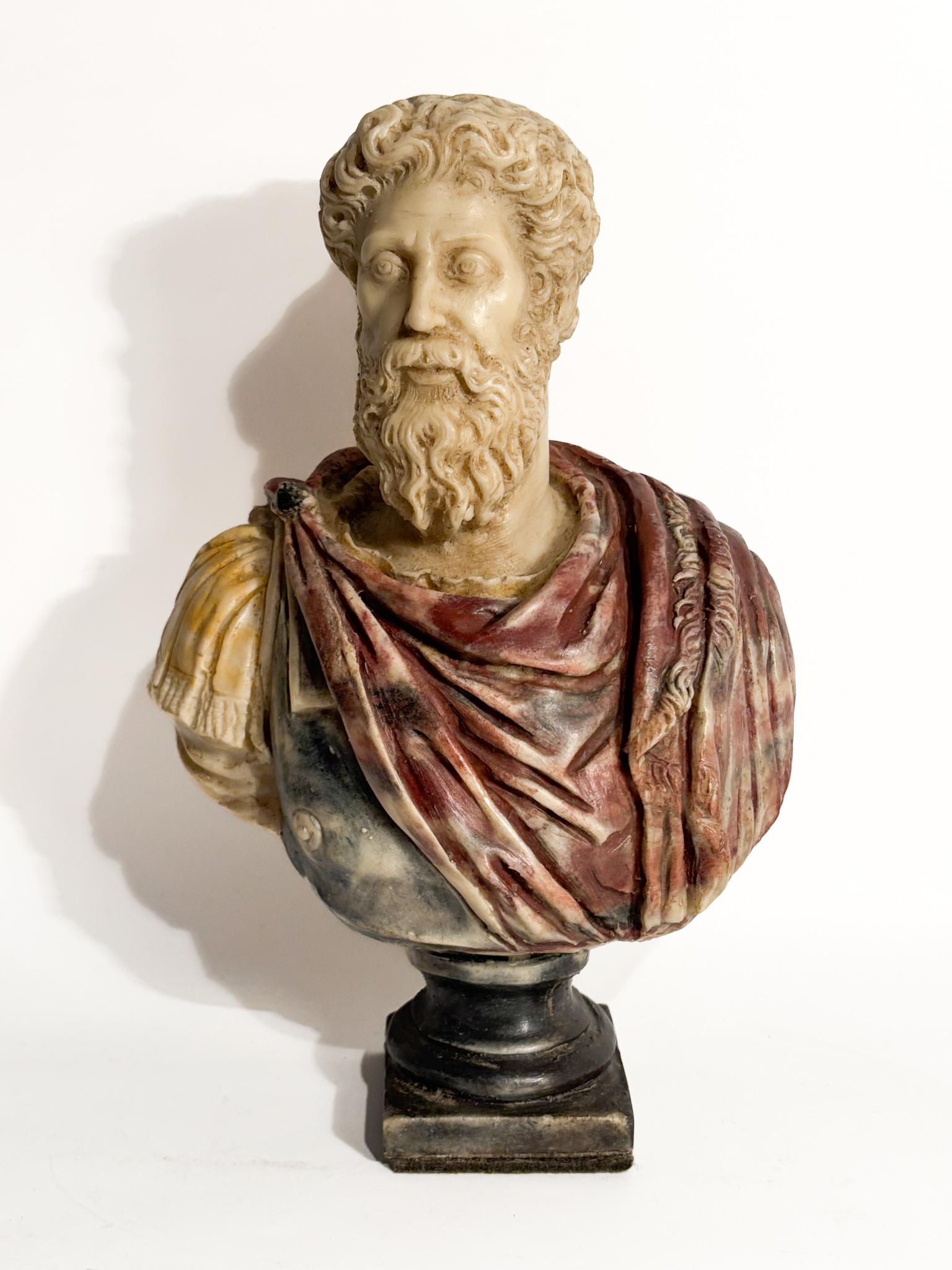 Polychrome resin bust depicting the Roman emperor Marcus Aurelius, made in the 1950s

Ø cm 17 Ø cm 9 h cm 26