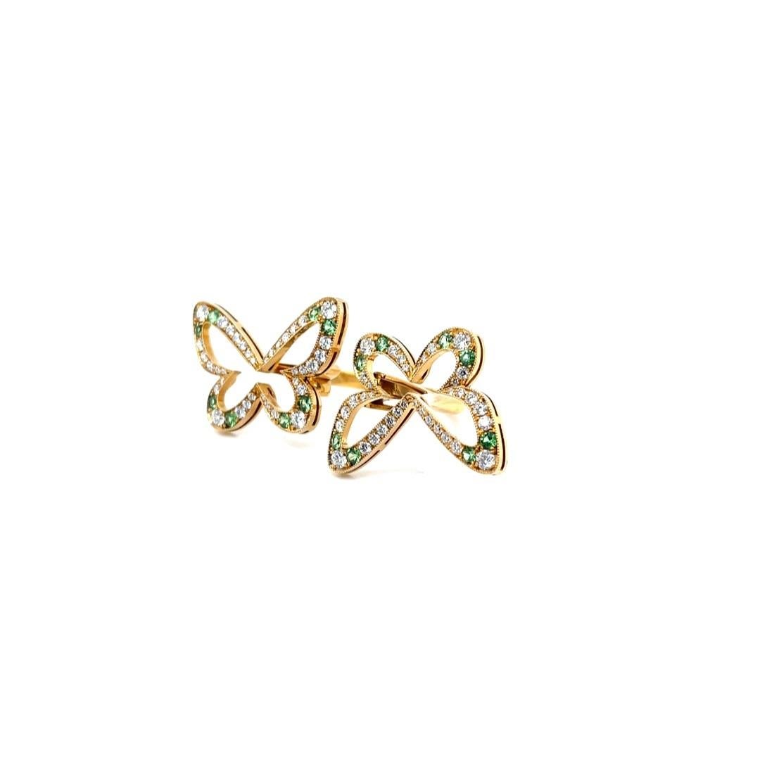 BUT2R18KY - Butterfly Ring 18K Yellow Gold
Metal: 18K Yellow Gold
Diamond/Stone Info: G/H SI, 72 Round Brilliant Diamonds, 0.83 cwt.
	                         16 Round Brilliant Tsavorite, 0.50 cwt. 
Total Diamond Weight: 0.83 cwt.
Total Stone