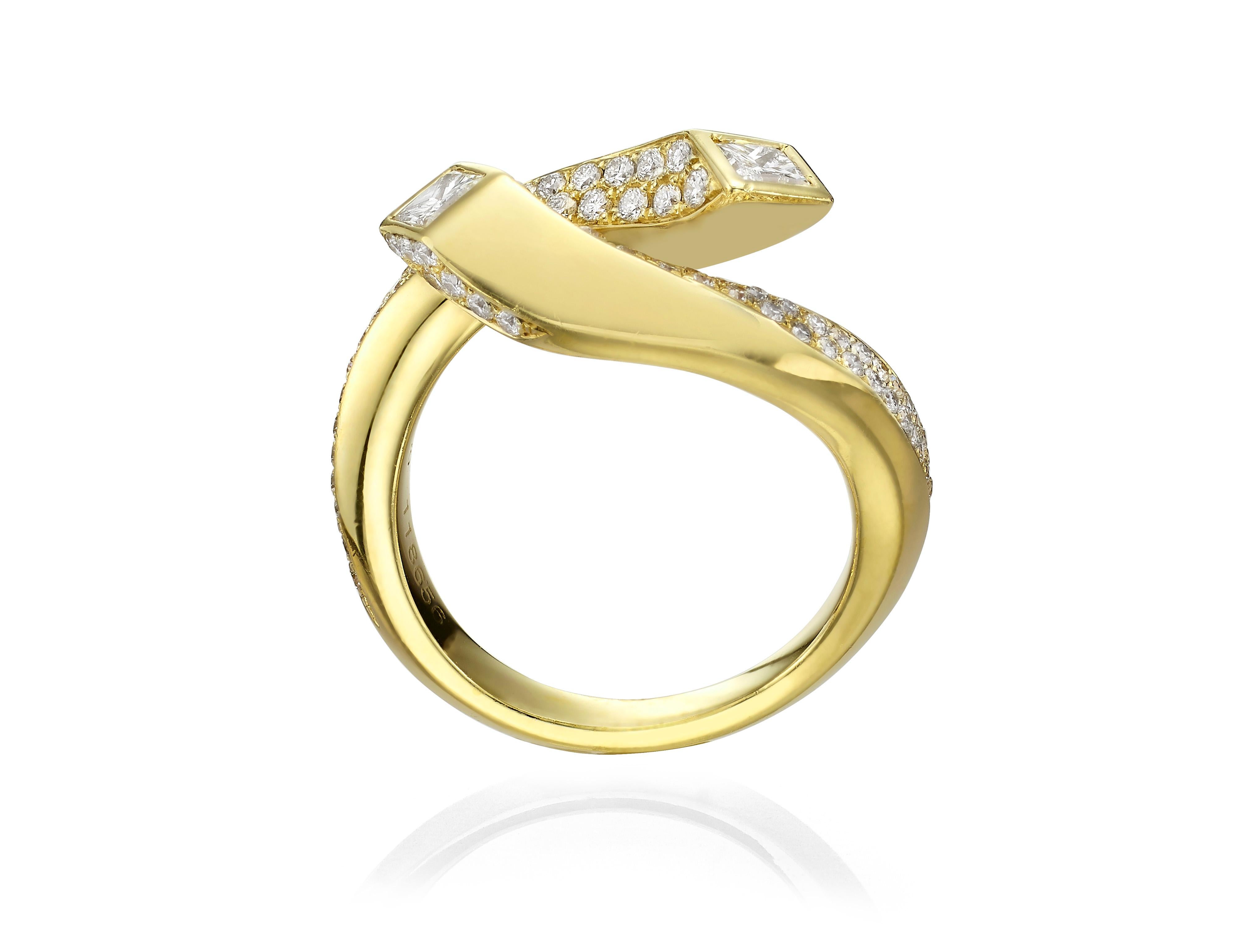 A beautiful everyday style ring, with two princess cut diamonds at the end (totaling 0.35 carats) and pave diamonds along the band (0.64 carats).  Set in 18K Yellow Gold.  
Currently a ring size US 6.5.  For other sizes, please contact seller.