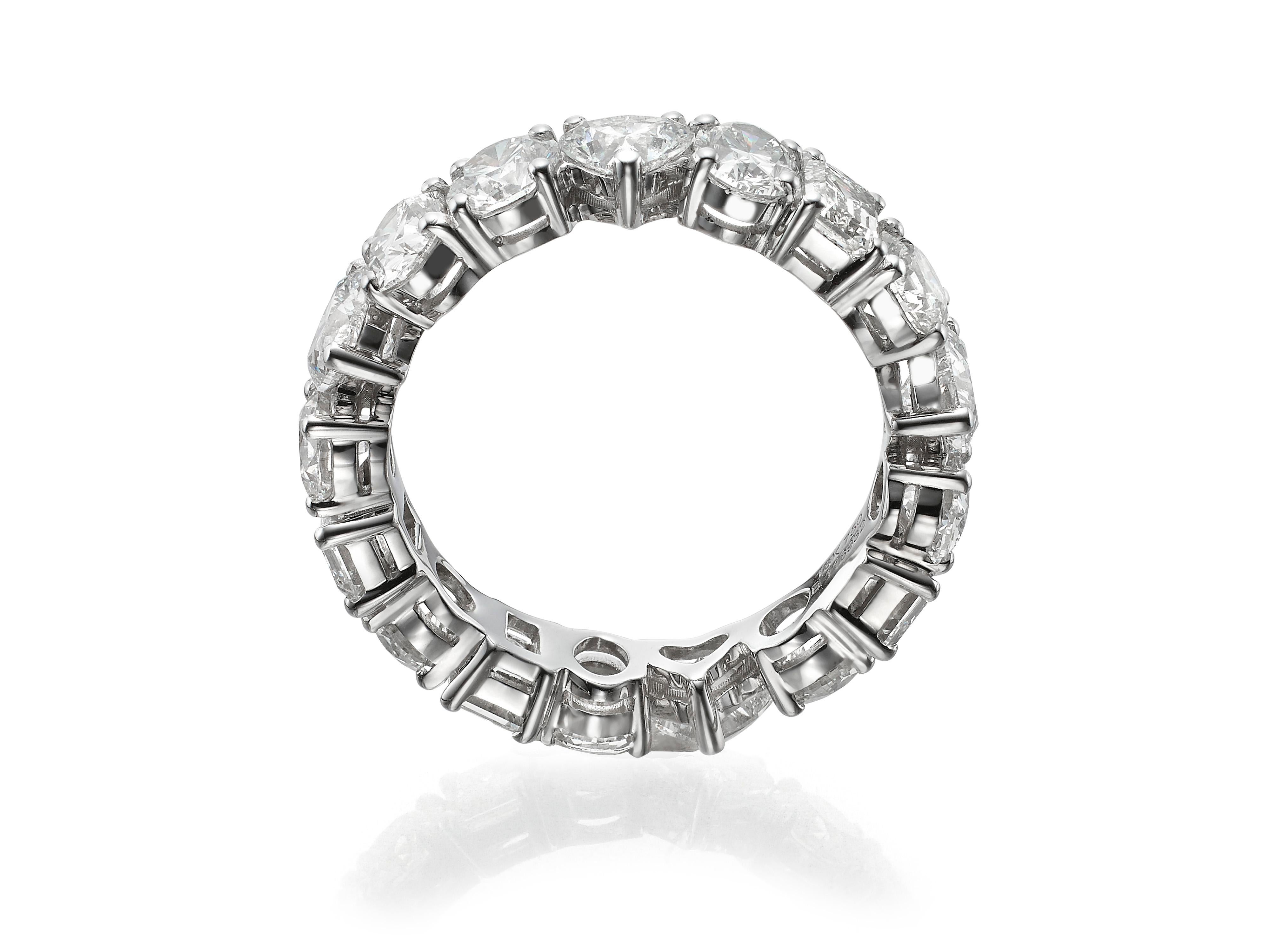 Butani's 5.30 carat multi shape diamond eternity band ring features 17 fancy cut diamonds including round brilliant, emerald, heart, and oval.  Perfect as a bridal piece worn with an engagement ring or alone as a statement.  Each diamond is