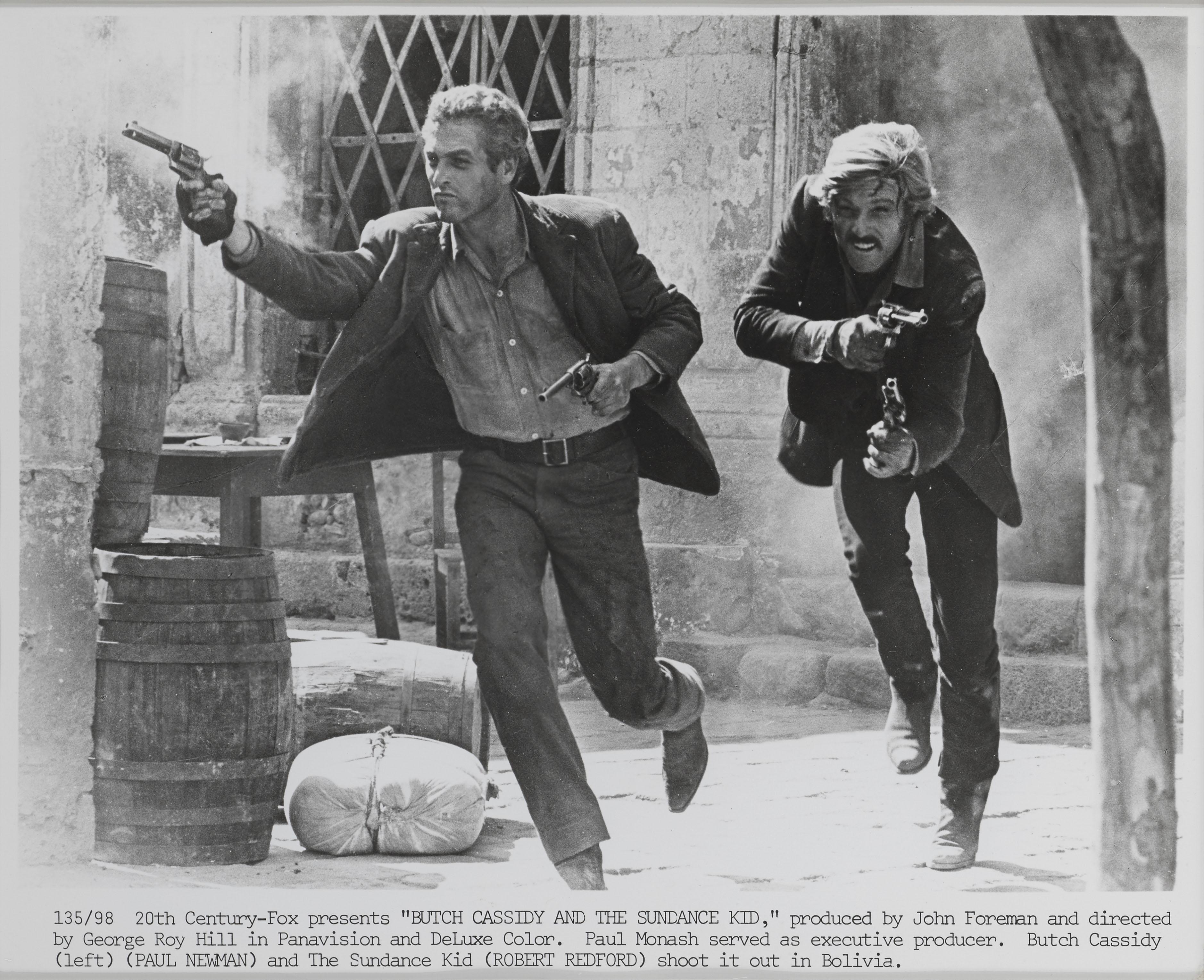 Fotograma original de producción del western clásico de 1969 protagonizado por Paul Newman, Robert Redford y Katherine Ross. Esta película fue dirigida por George Roy Hill. Esta pieza está enmarcada en un marco de madera de sapeli con monturas de