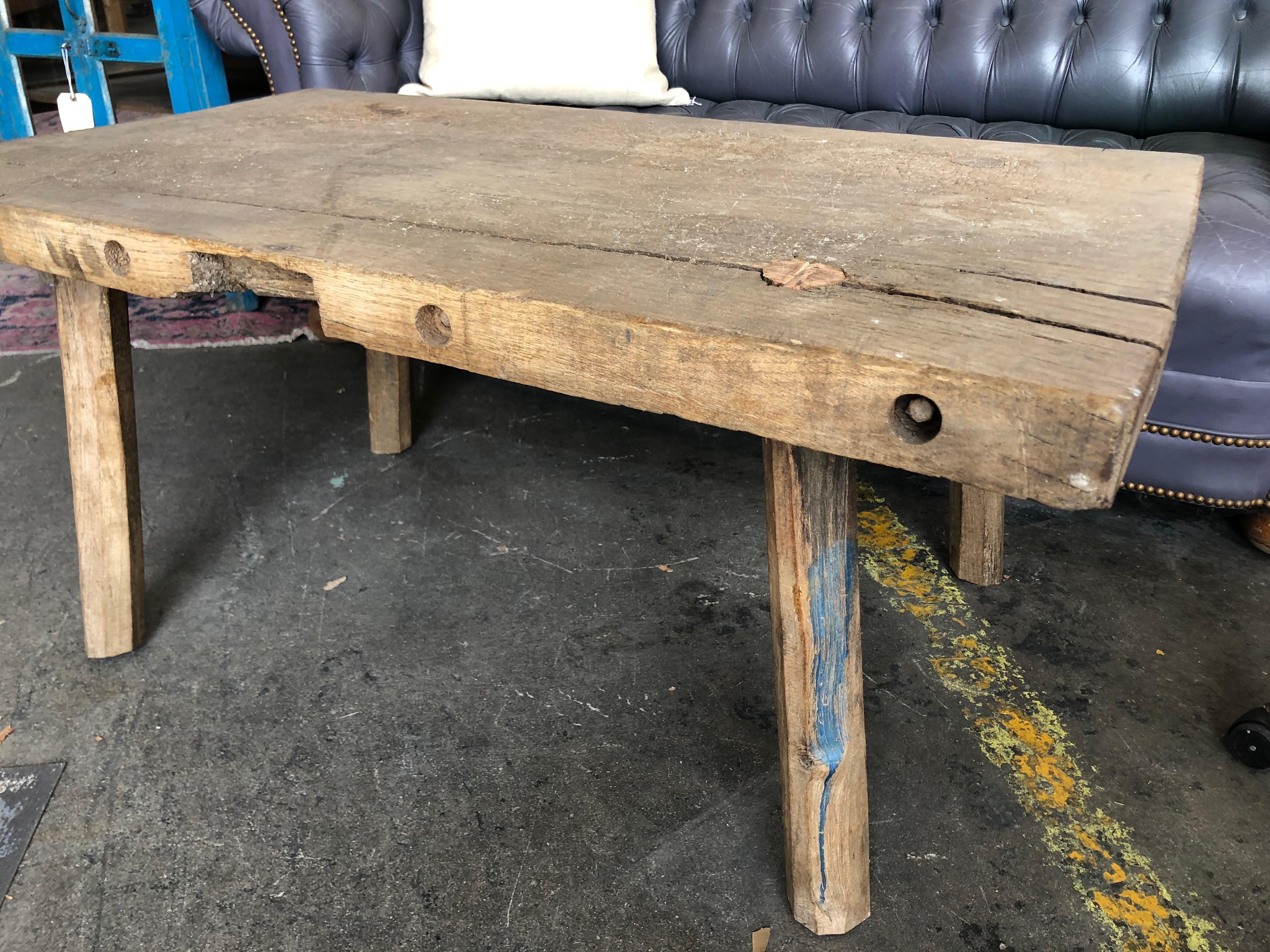 This one of a kind butcher block table from Europe is sure to add warmth and character to any room.