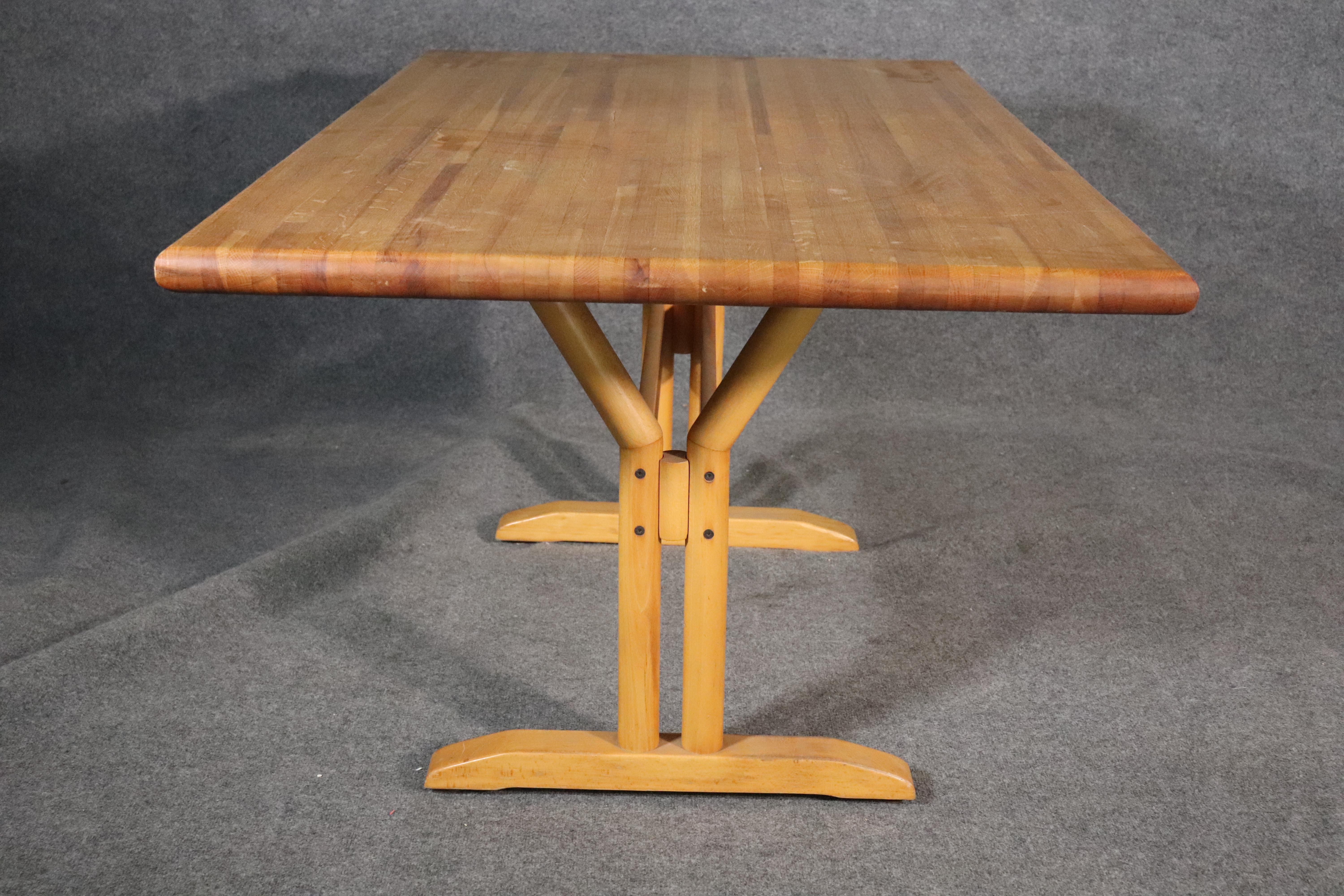Farm house style wood dining table with a butcher block top. Bright oak wood coloring table on a Y-shape base.
Please confirm location NY or NJ.