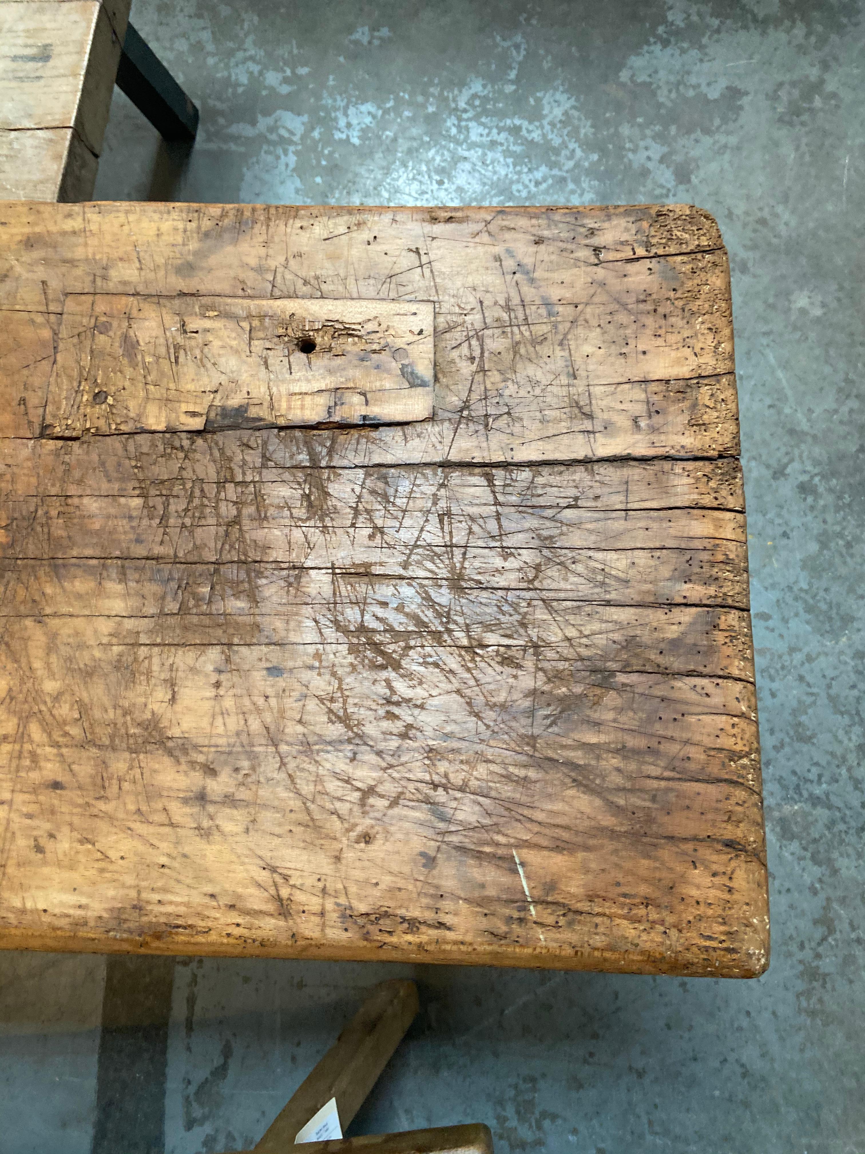 This vintage butcher block can be used as a console or dining table. With beautiful patina, the character of these tables will compliment any space.