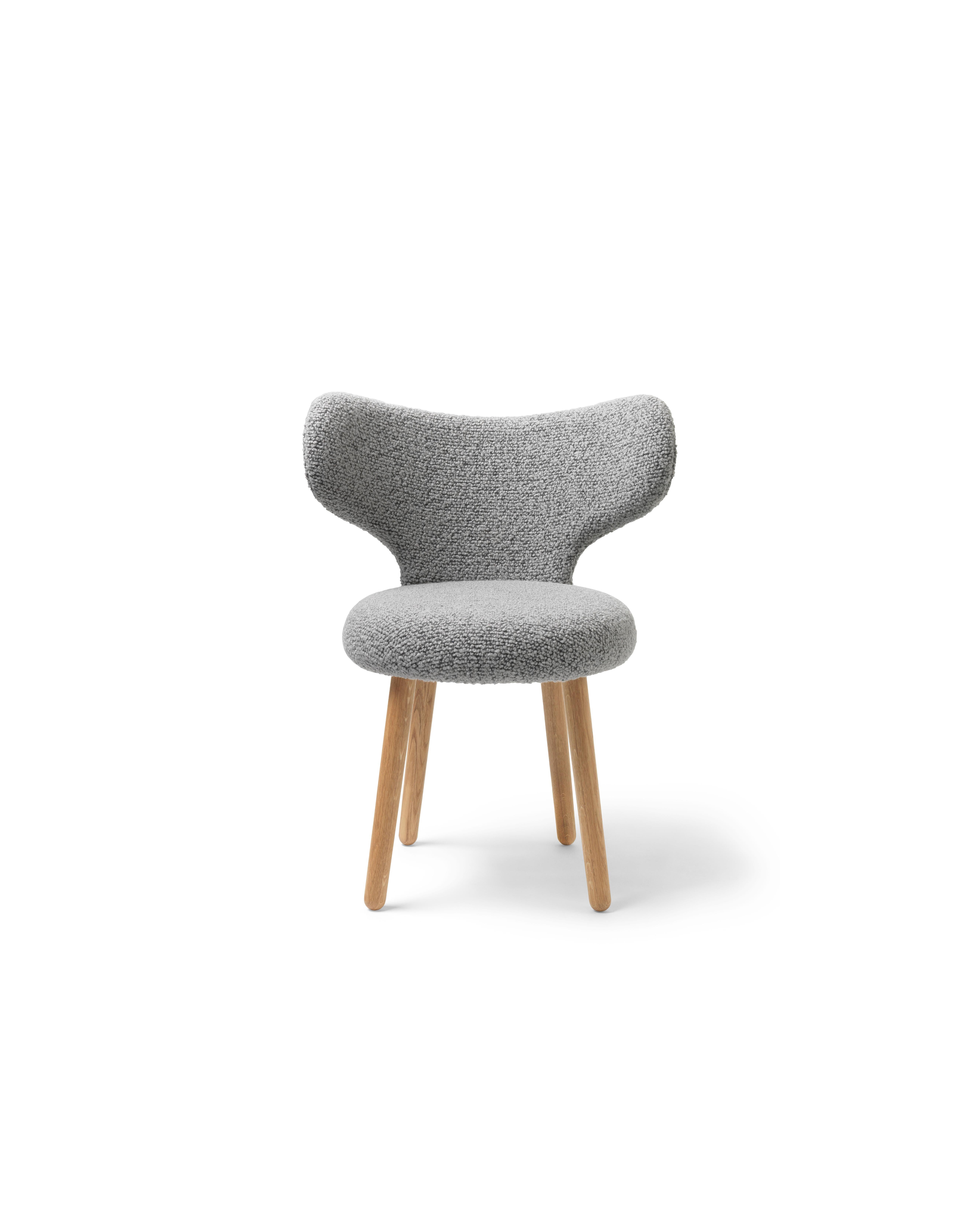 BUTE/Storr WNG chair by Mazo Design
Dimensions: W 60 x D 50 x H 76 cm
Materials: Oak, Textile
Also Available: DAW/Royal, KVADRAT/Hallingdal & Fiord, KVADRAT/ Vidar, DAW/Mcnutt, DEDAR/Artemidor, Sheepskin.
The WNG Chair’s rounded shape is puffed