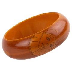 Butler and Wilson Butterscotch Bakelite Bracelet Bangle with Pierrot Design