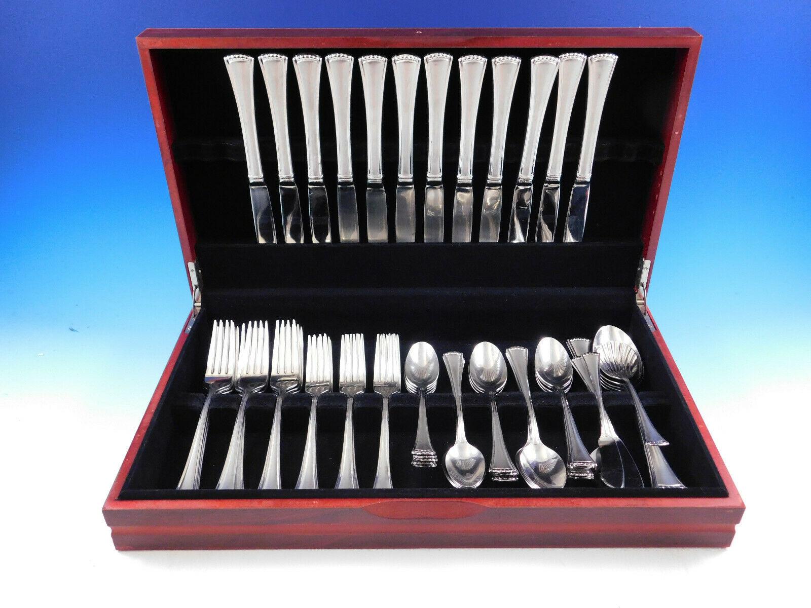 Modern and large European size Butlers Pantry by Lenox Stainless Steel Flatware set, 64 pieces. This set includes:

12 large dinner knives, 10