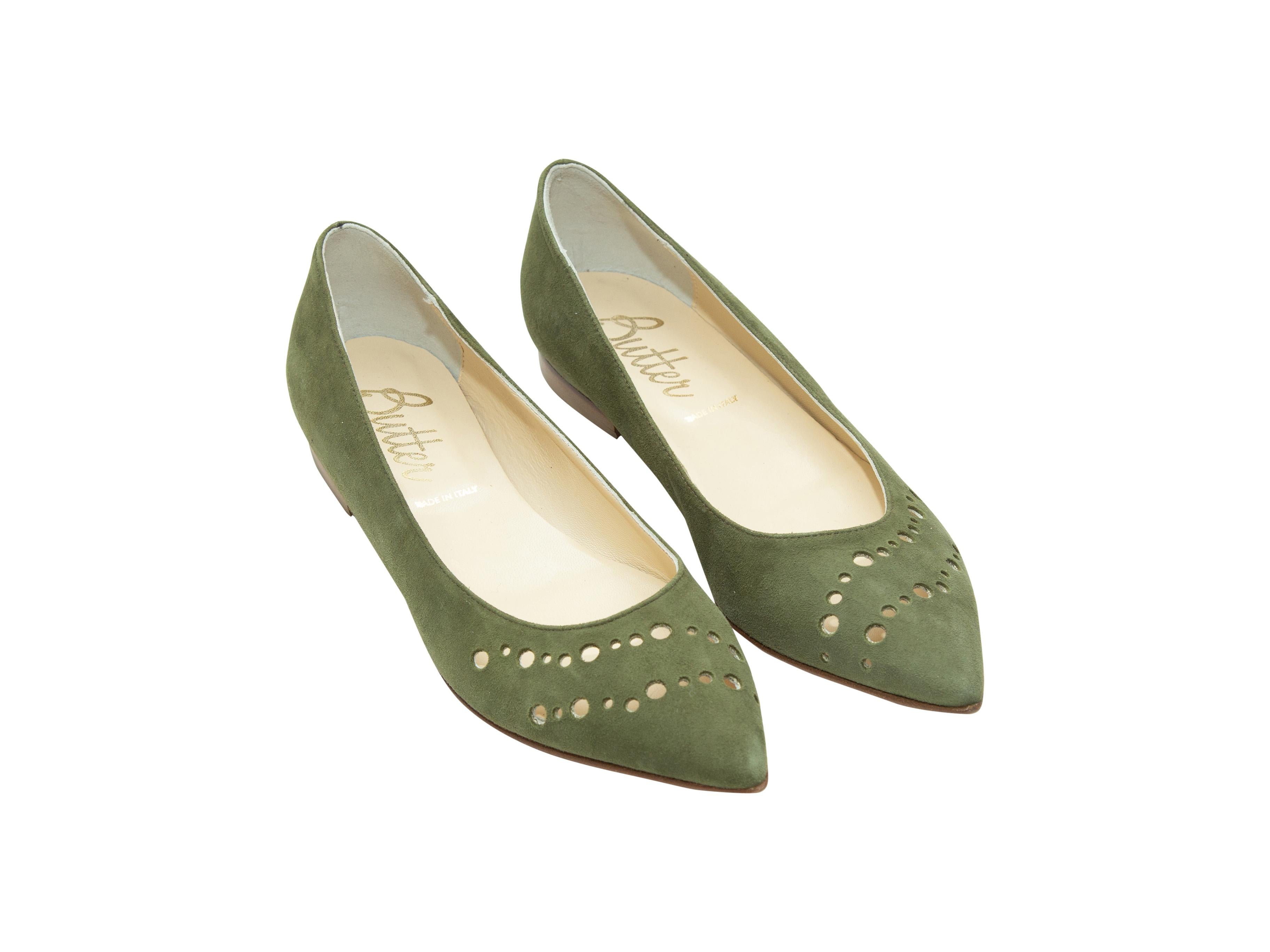 Product details: Olive green suede pointed-toe ballet flats by Butter. Circular cutout detailing at toes. 0.5