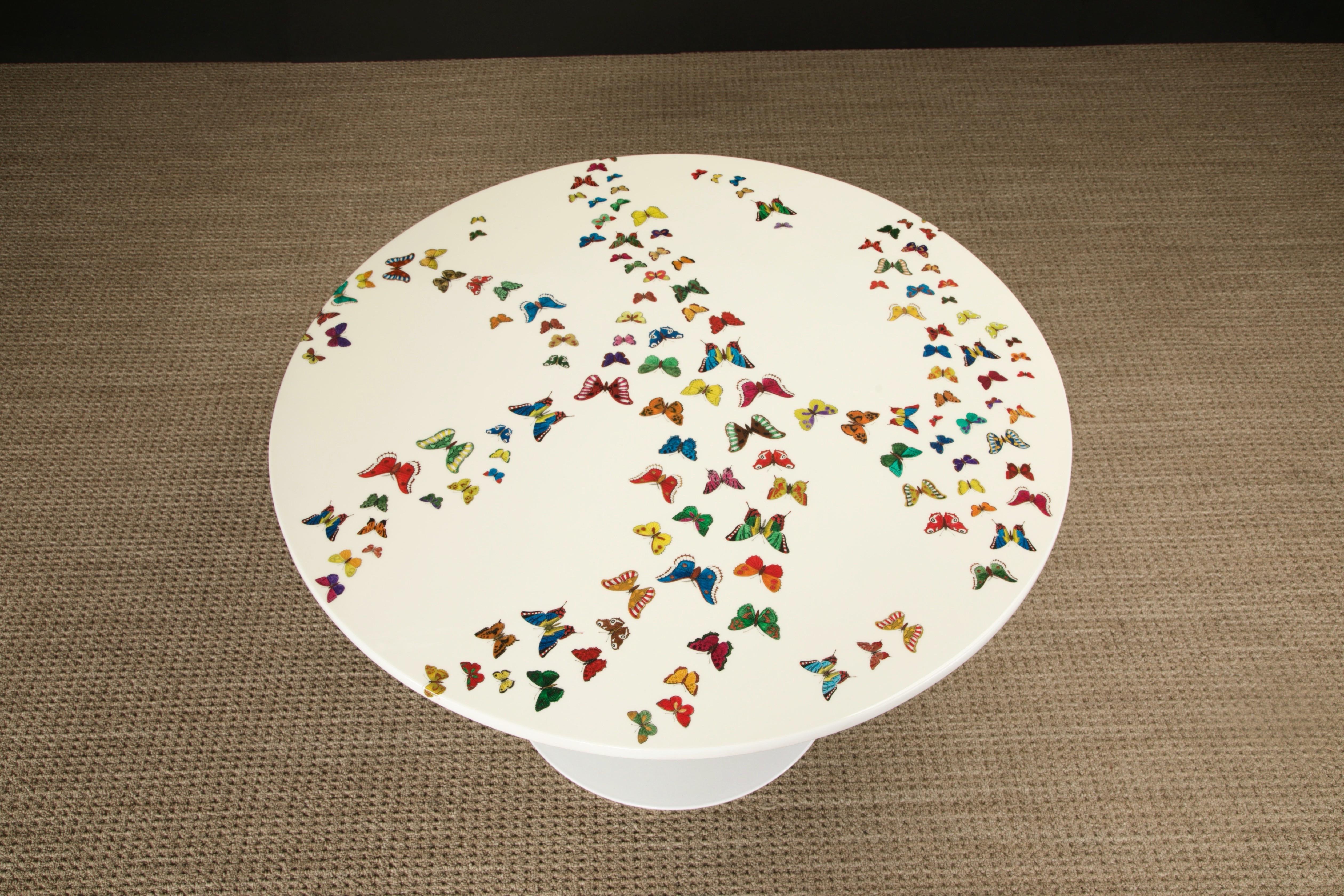 This pièce de résistance collectors item is the 'Farfalle' (translated to 'Butterflies') dining table by Piero Fornasetti, circa 1970s, signed underneath with its original studio label. Table height is a perfect 29.25