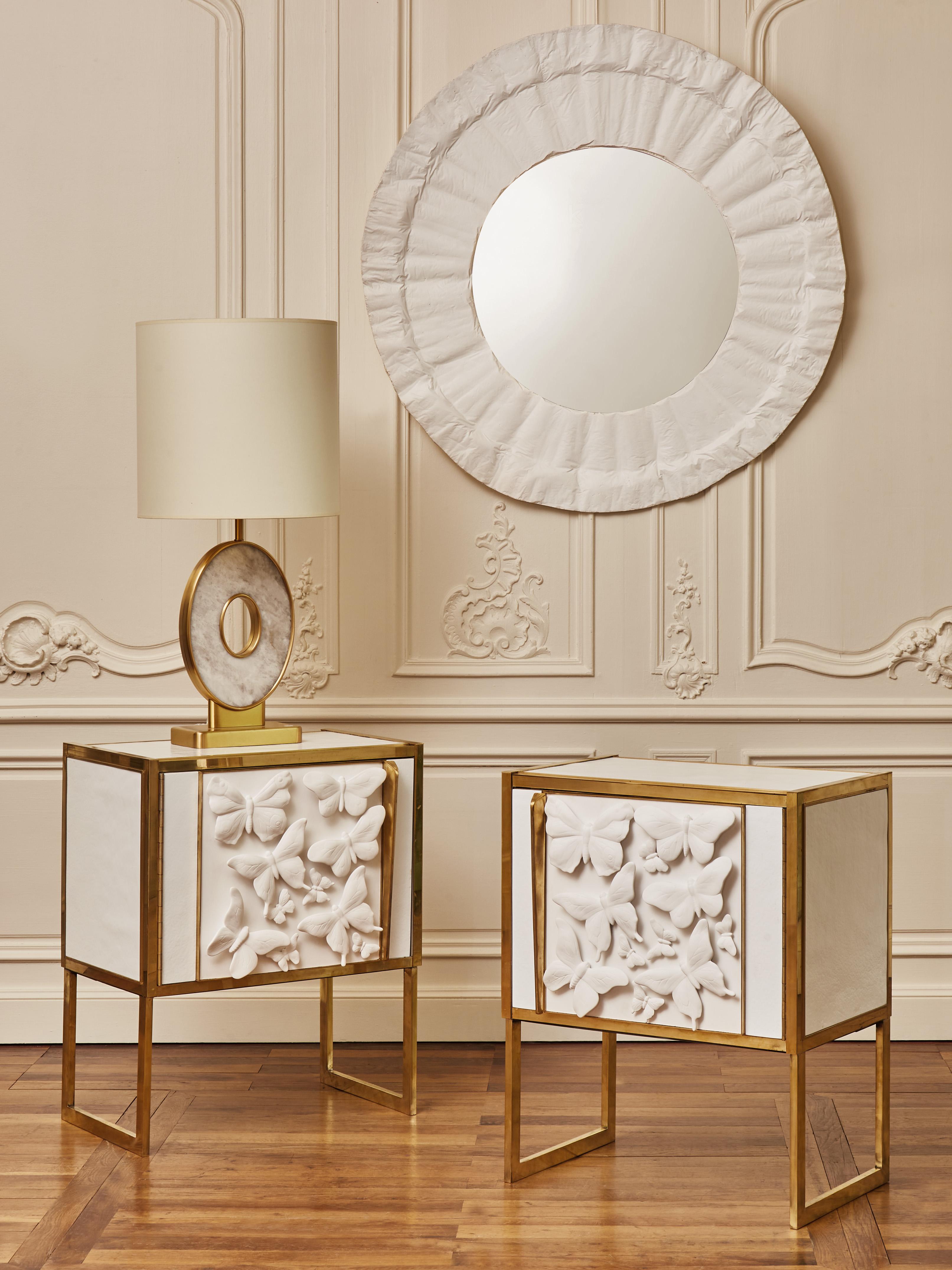 Exceptional pair of nightstands with front door in sculpted ceramic, tainted mirror and brass. 
Creation by Studio Glustin.
   