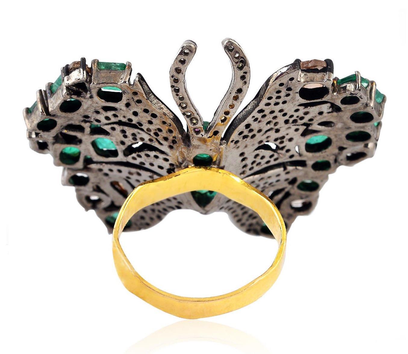 This stunning ring has been meticulously crafted from 14-karat gold & sterling silver with blackened finish. Handcrafted with 4.92 carats emerald and illuminated with 2.96 carats glimmering diamonds. 

The ring is a size 7 and may be resized to