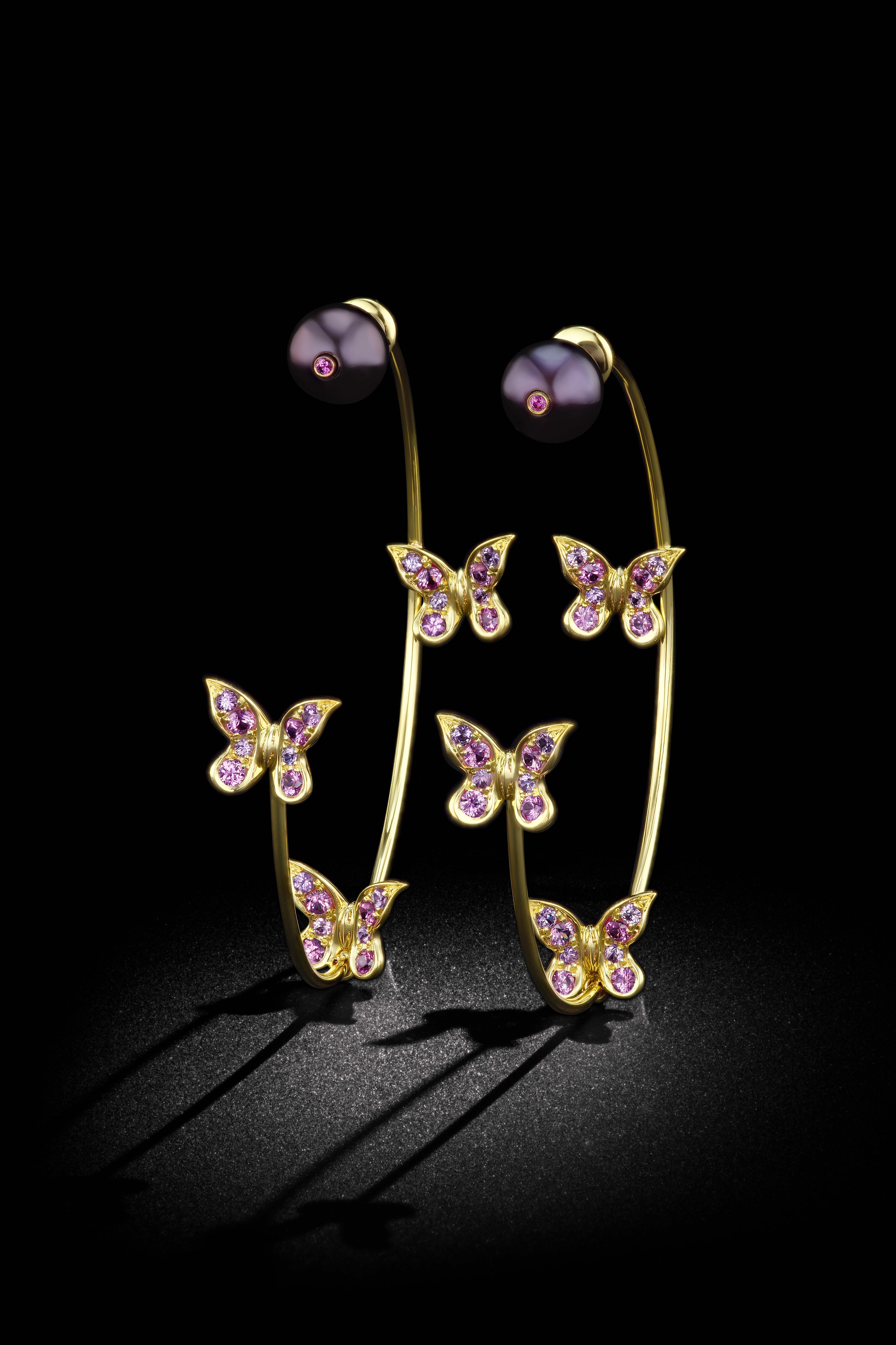 Butterfly and Pearl Flexible Earrings. 18K yellow gold with gold mother of pearl with butterflies in dark pink and purple sapphires. 

