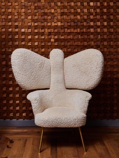 Fauteuil papillon de Studio Glustin