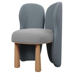 Butterfly Armchair in blue and grey plain weave fabric handcrafted by Murmurio