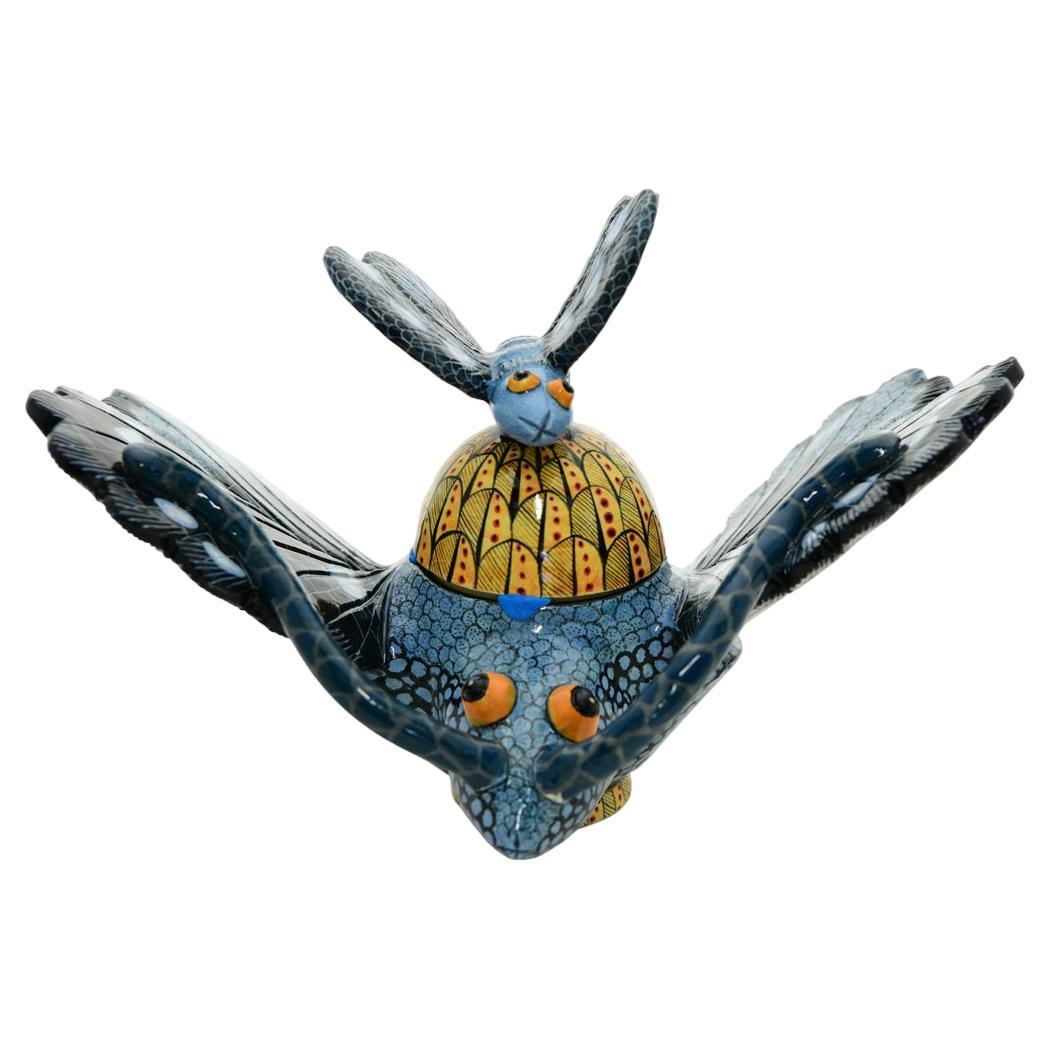 This Butterfly Box was hand sculpted by the renowned artisan Sbusiso Ndaba and beautifully painted by Sabelo Nene both from South Africa. This exquisite ceramic creation stands 6 inches high, measuring 9 inches in length and 8 inches in width. 
A