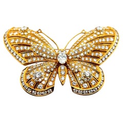 Broche Mariposa con Diamantes en Oro Amarillo de 18 Kilates