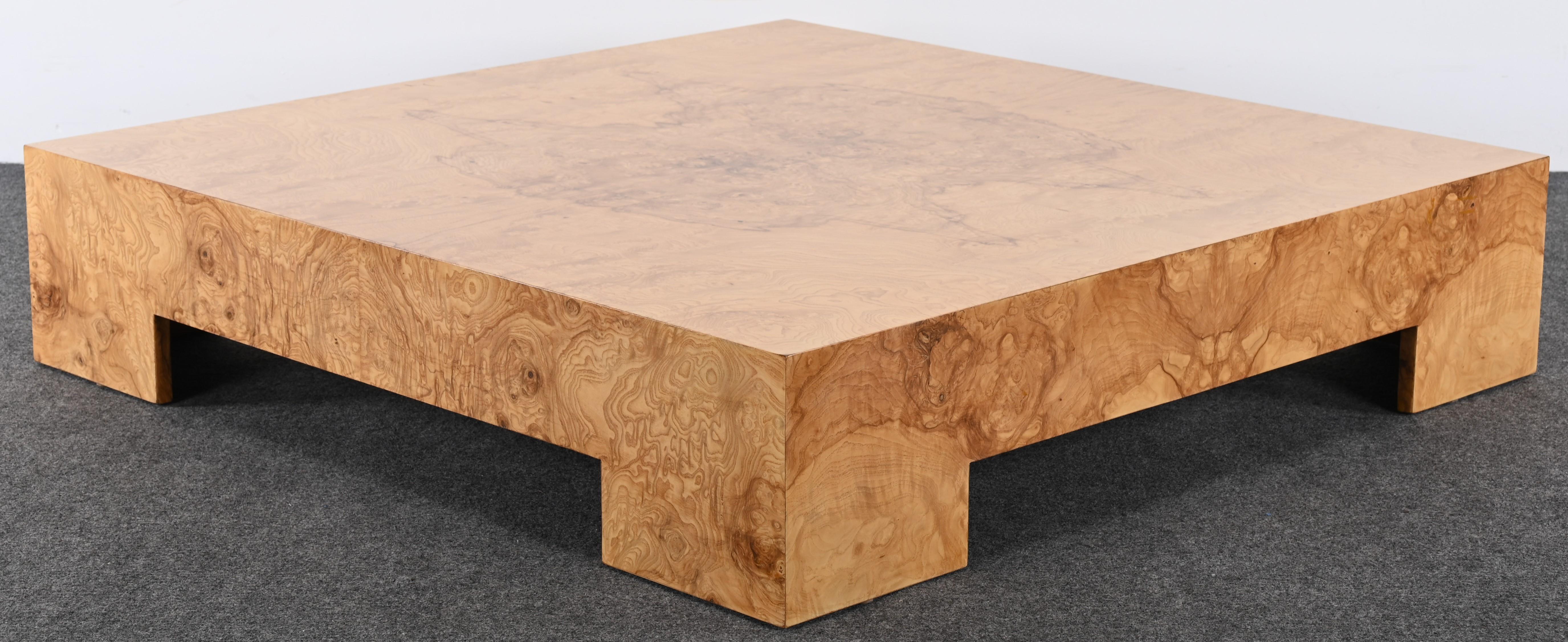 A gorgeous large-scale square modern form burled maple coffee table designed by Milo Baughman with a newly restored lacquer finish in excellent condition. This table is a classic design that would fit well in any interior such as mid-century modern,