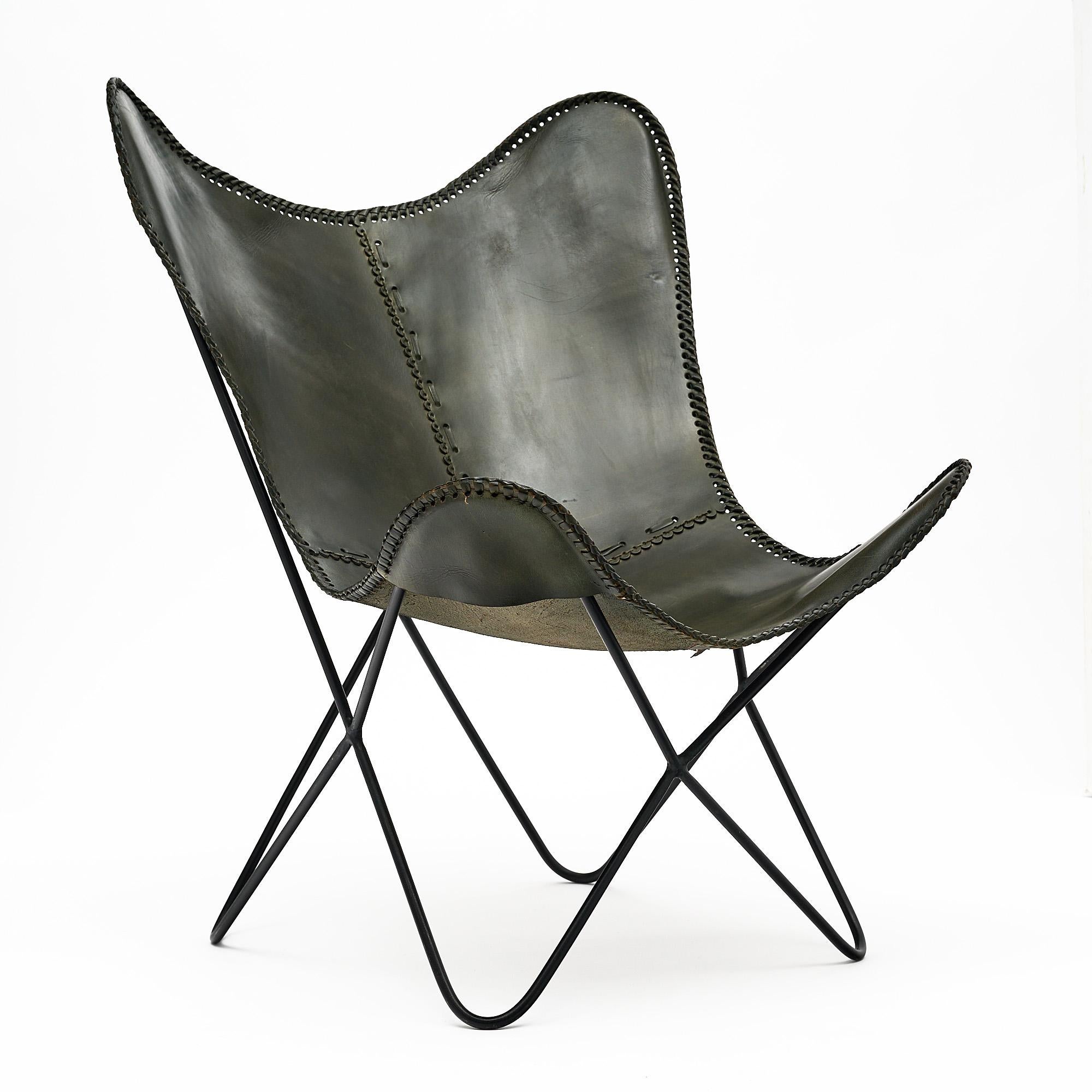 BKF chair, also known as butterfly chair by Jorge Ferrari Hardoy for Knoll. This piece is made of painted wrought iron and the seat is the original leather with detailing throughout.