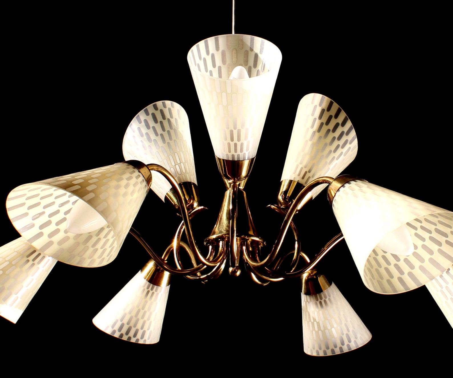 Romantic 1950s butterfly chandelier / Germany. 9-light (e14) / rewired
Brass and fine enameled art glass blossoms

Measures: Diameter 24 inches, original height 32 inches

This fine small chandelier is a timeless and elegant masterpiece of